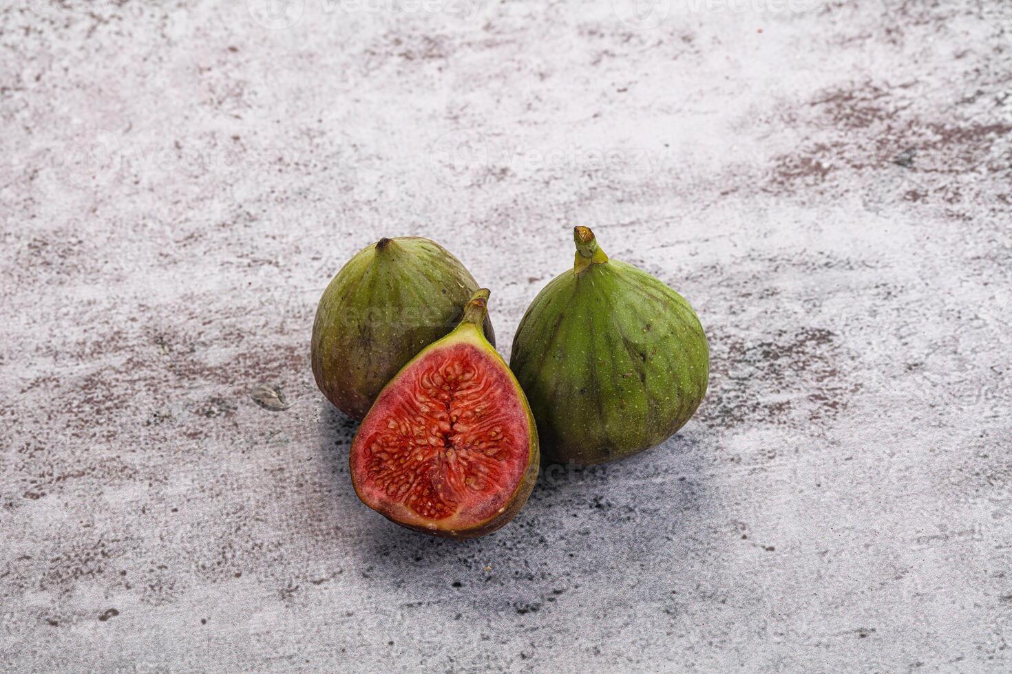 Figs on a concrete surface photo