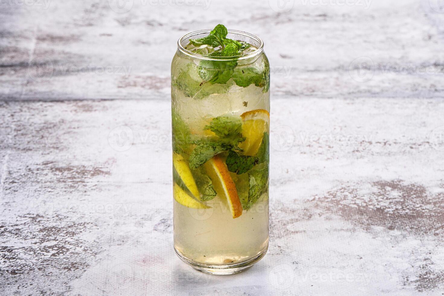 A glass filled with a drink photo