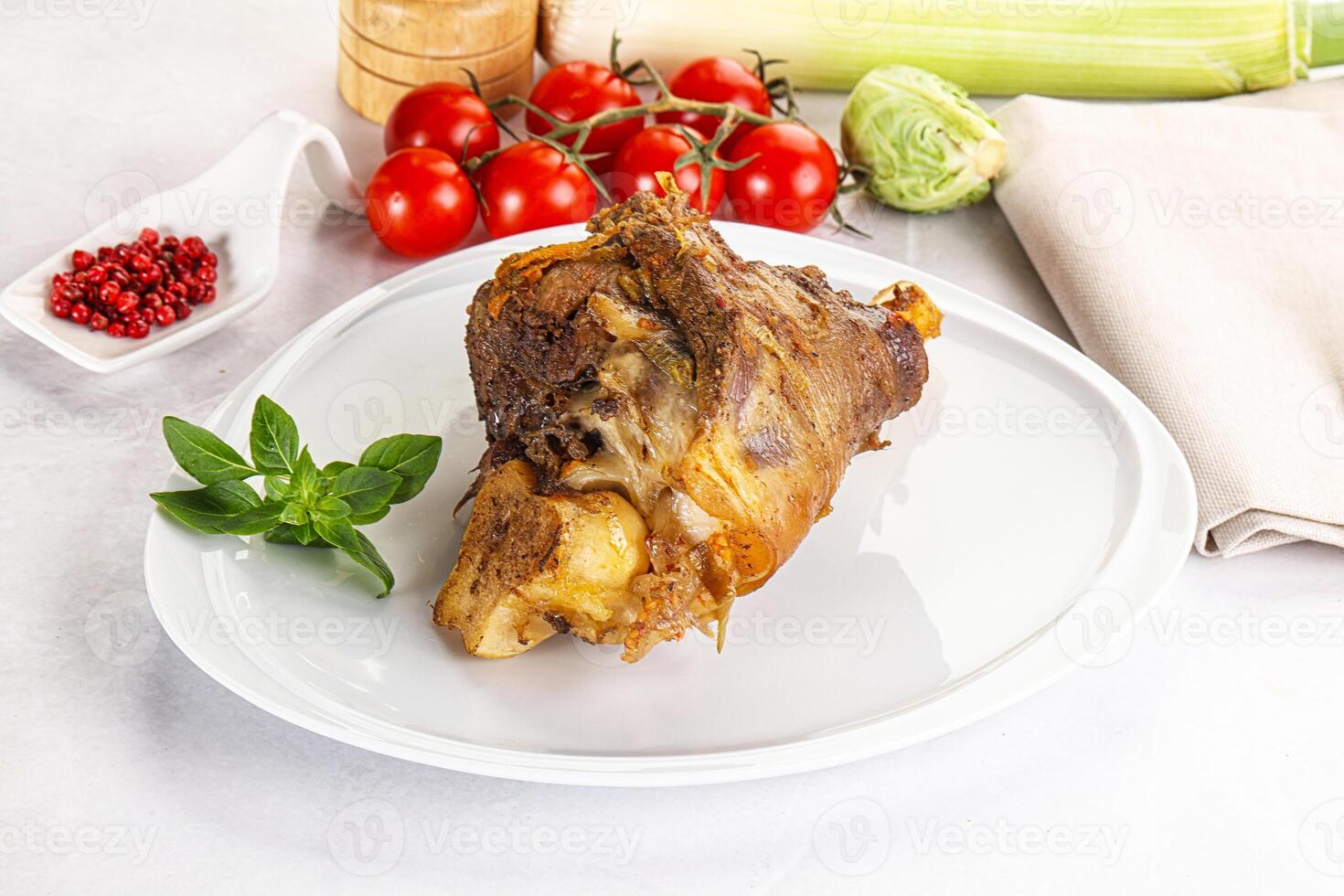 A plate with a piece of meat on it photo