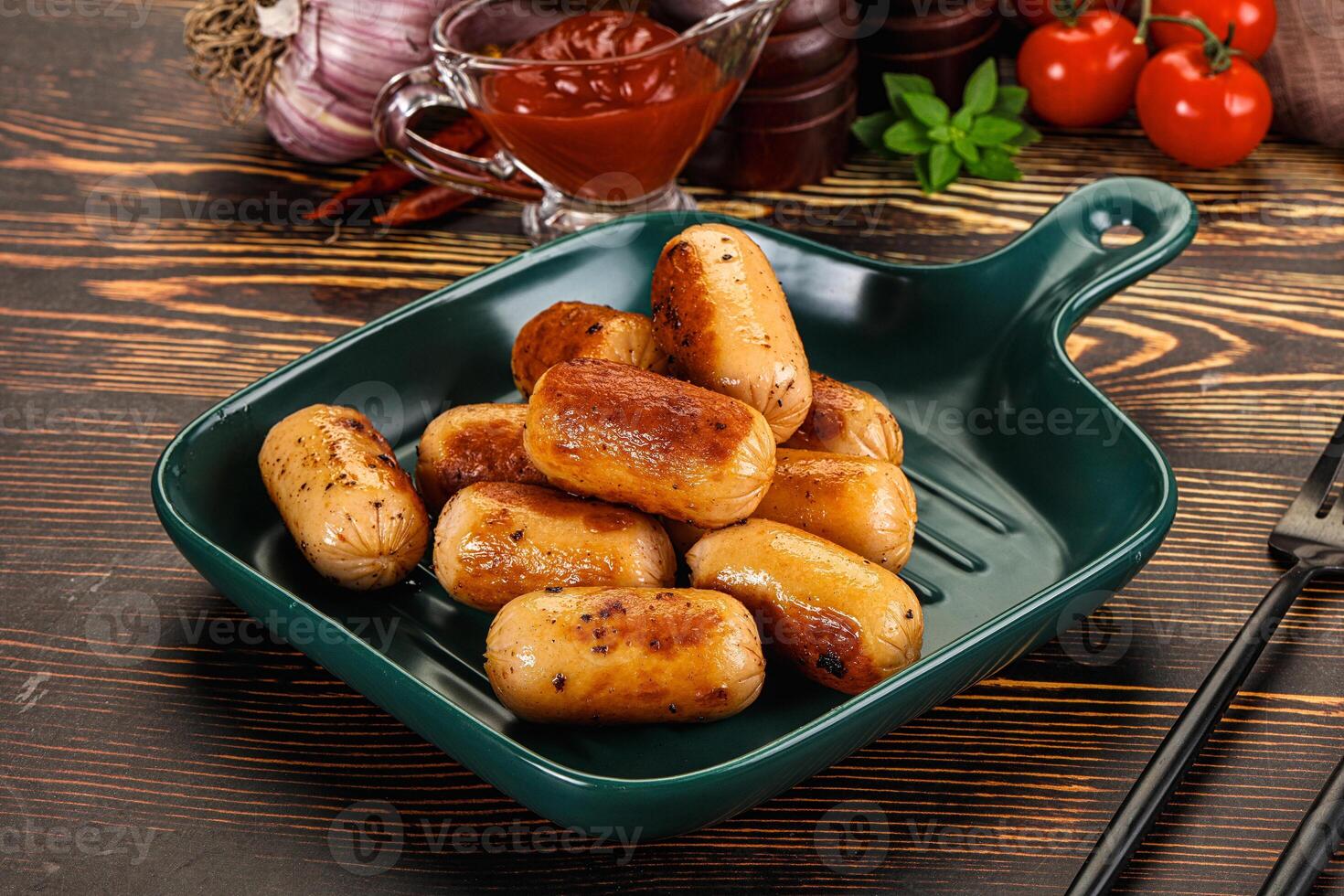 A plate of food on a table with a fork and knife photo