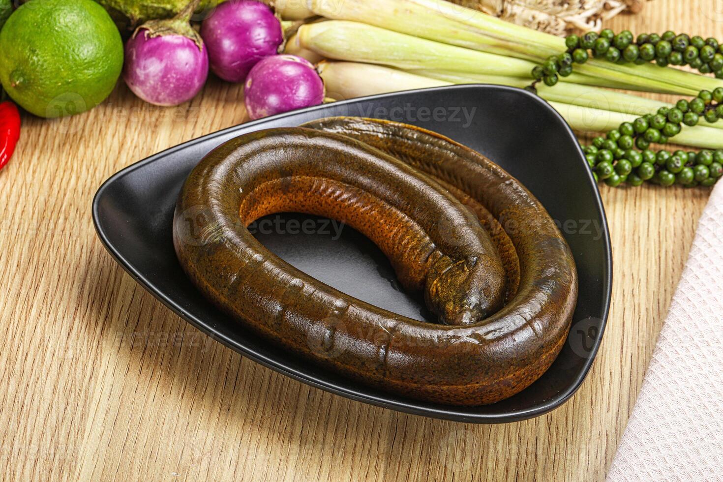 A plate of food with a worm in it photo