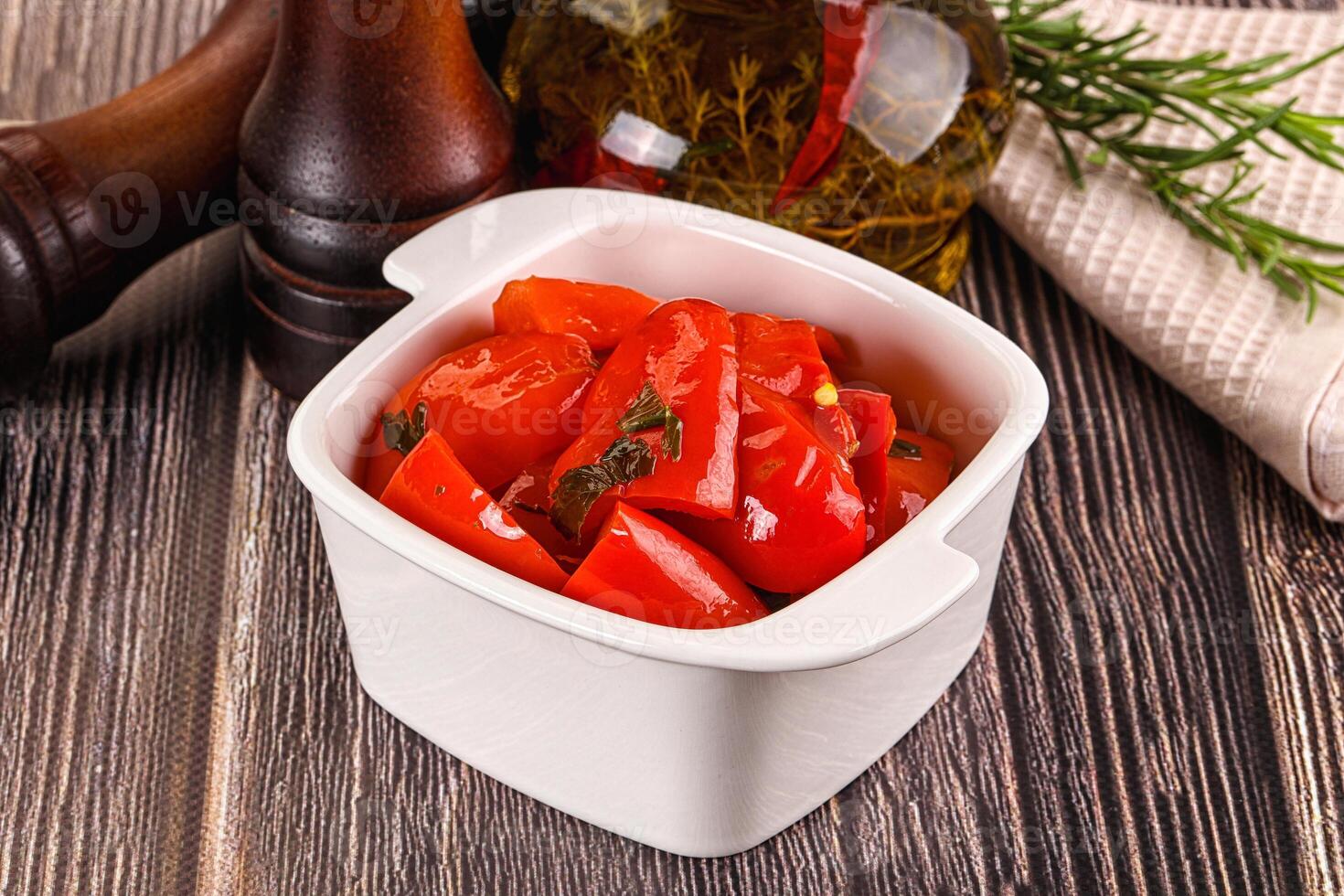 A white bowl with tomatoes and herbs photo