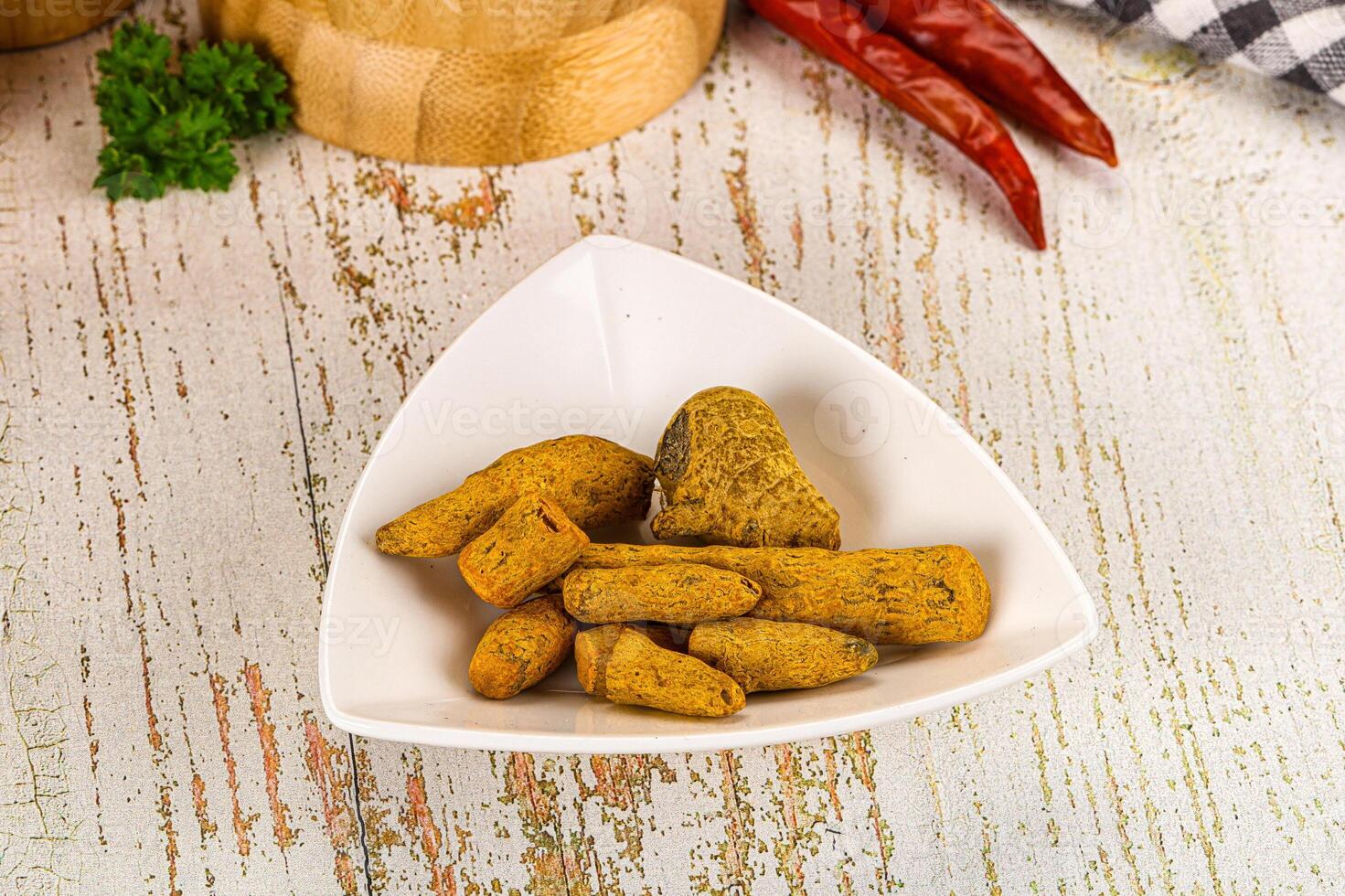 A white bowl with some food on it photo