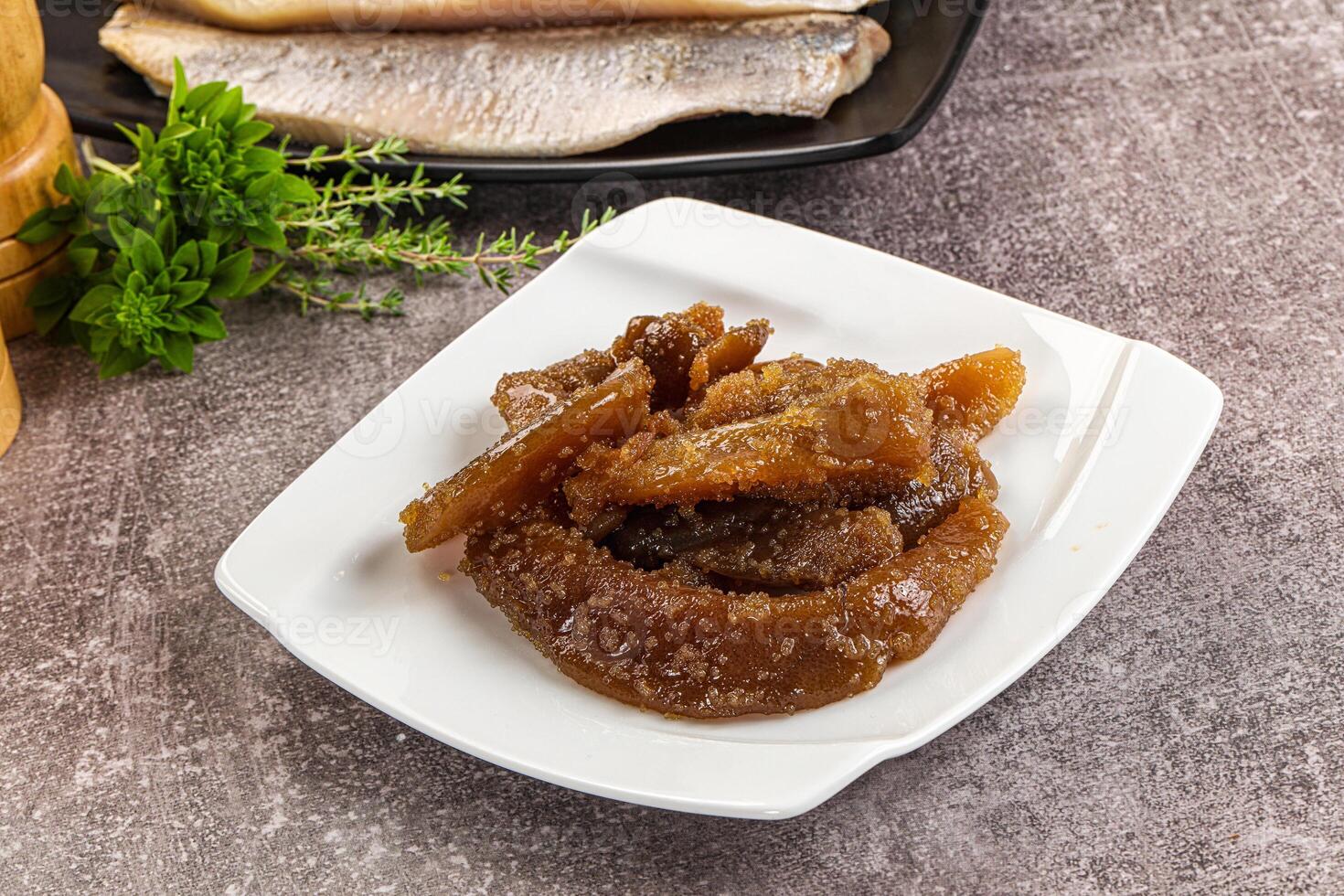 A plate of food with a knife and fork photo