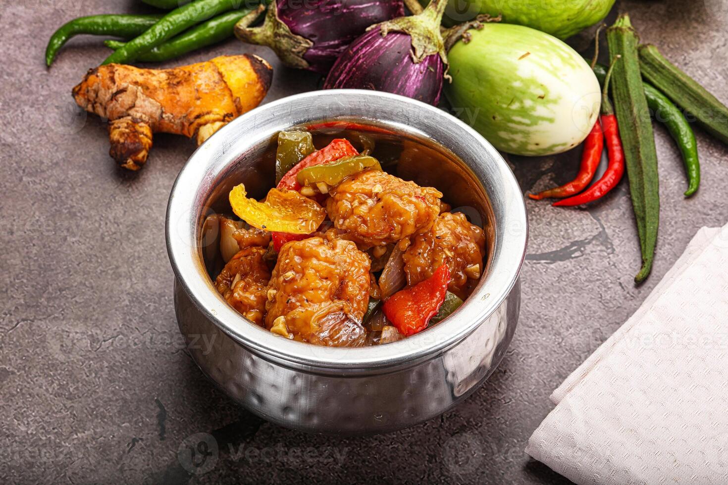 A silver container with food in it photo