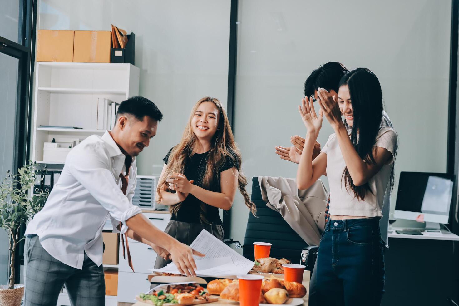 Business people celebrating after a successful project photo