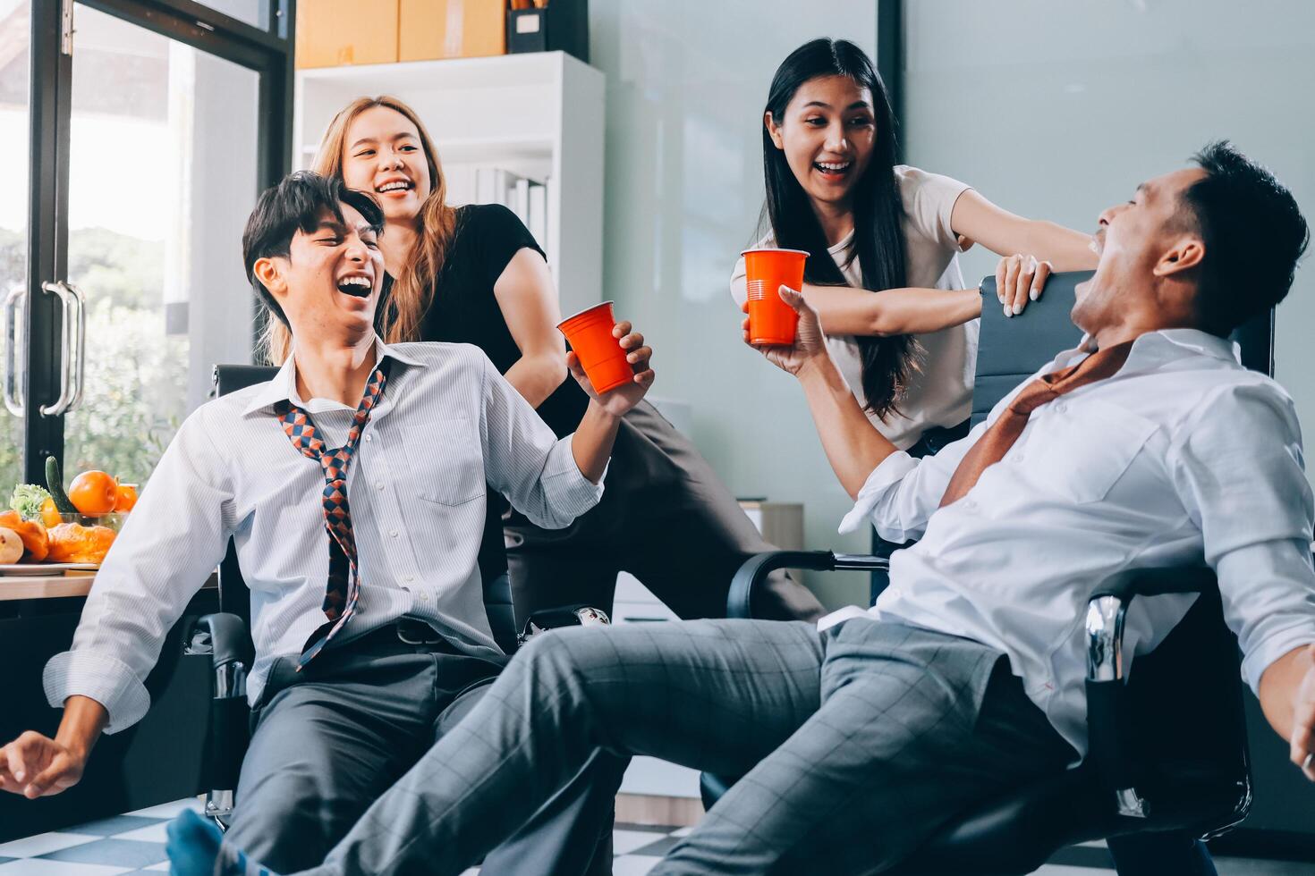 Group of business people having fun in office photo