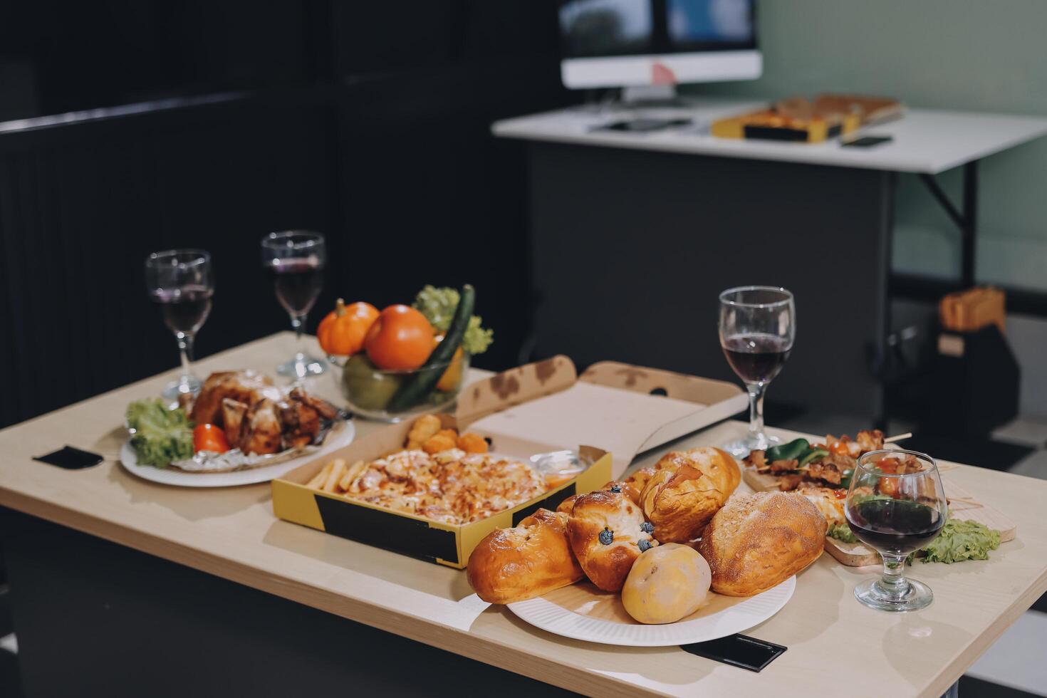A table with food and wine on it photo