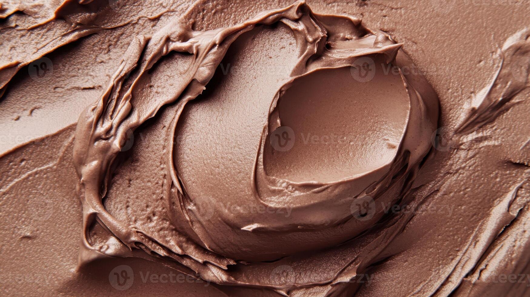 Chocolate frosting spread elegantly across a surface, showcasing creamy texture and rich color in a close-up view photo