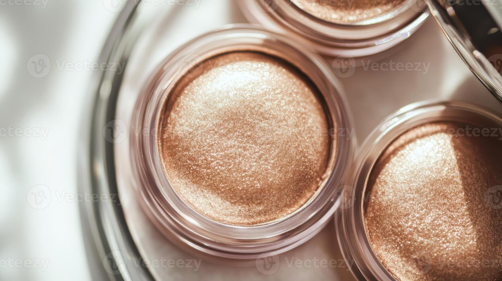 High-quality shimmering eyeshadow products displayed in clear containers capturing natural light during a makeup session at a vanity photo