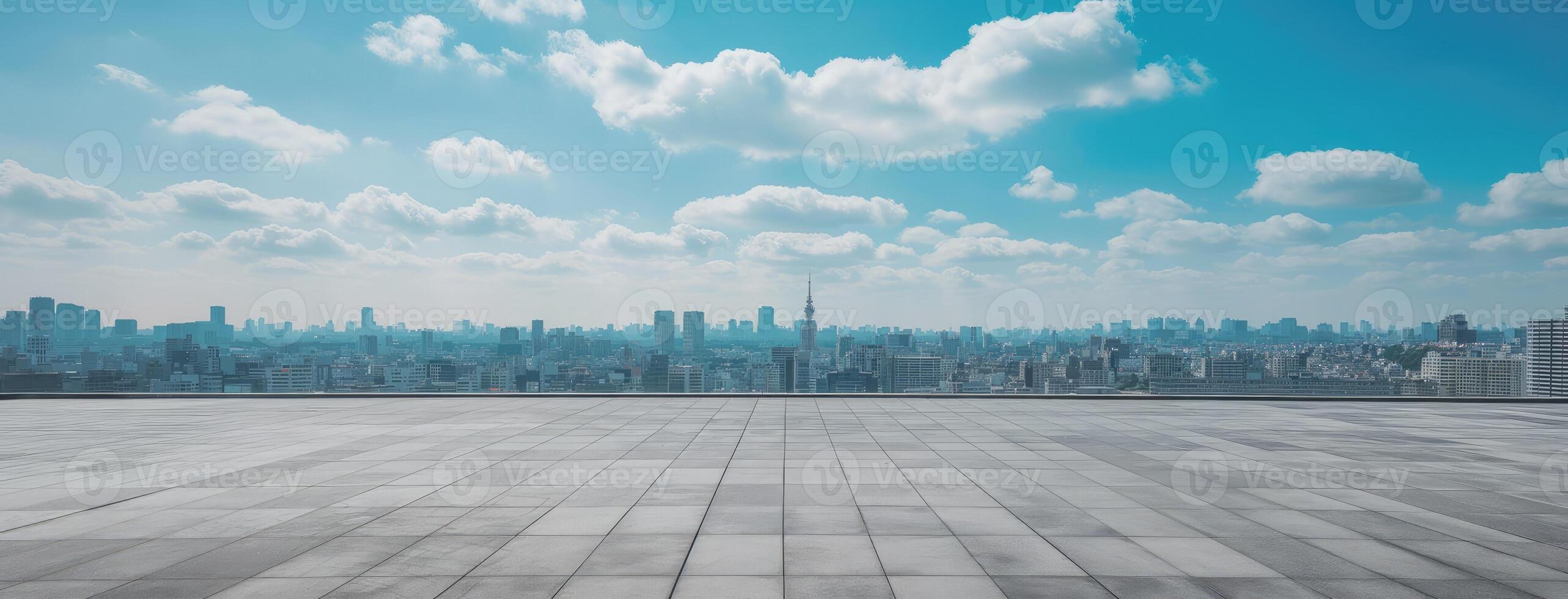 Empty concrete floor with cityscape in background photo