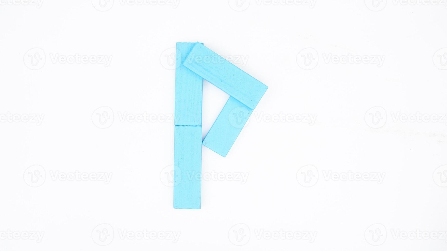 Letter P from blue color wood block isolated on white background photo