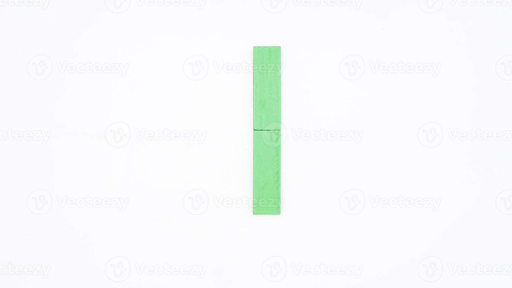 Letter I from green color wood block isolated on white background photo