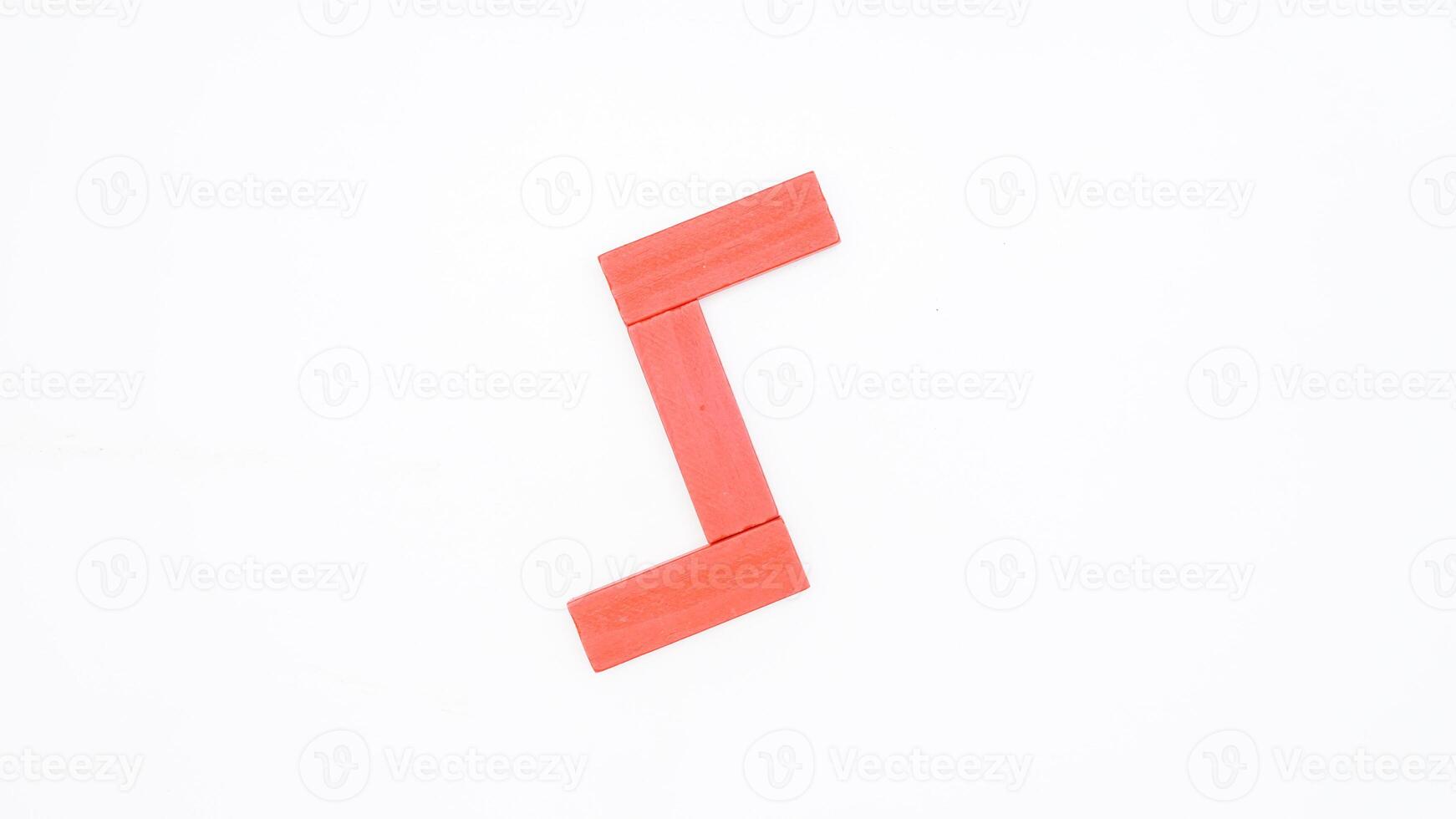Isolated letter S from red color wood block on white background photo
