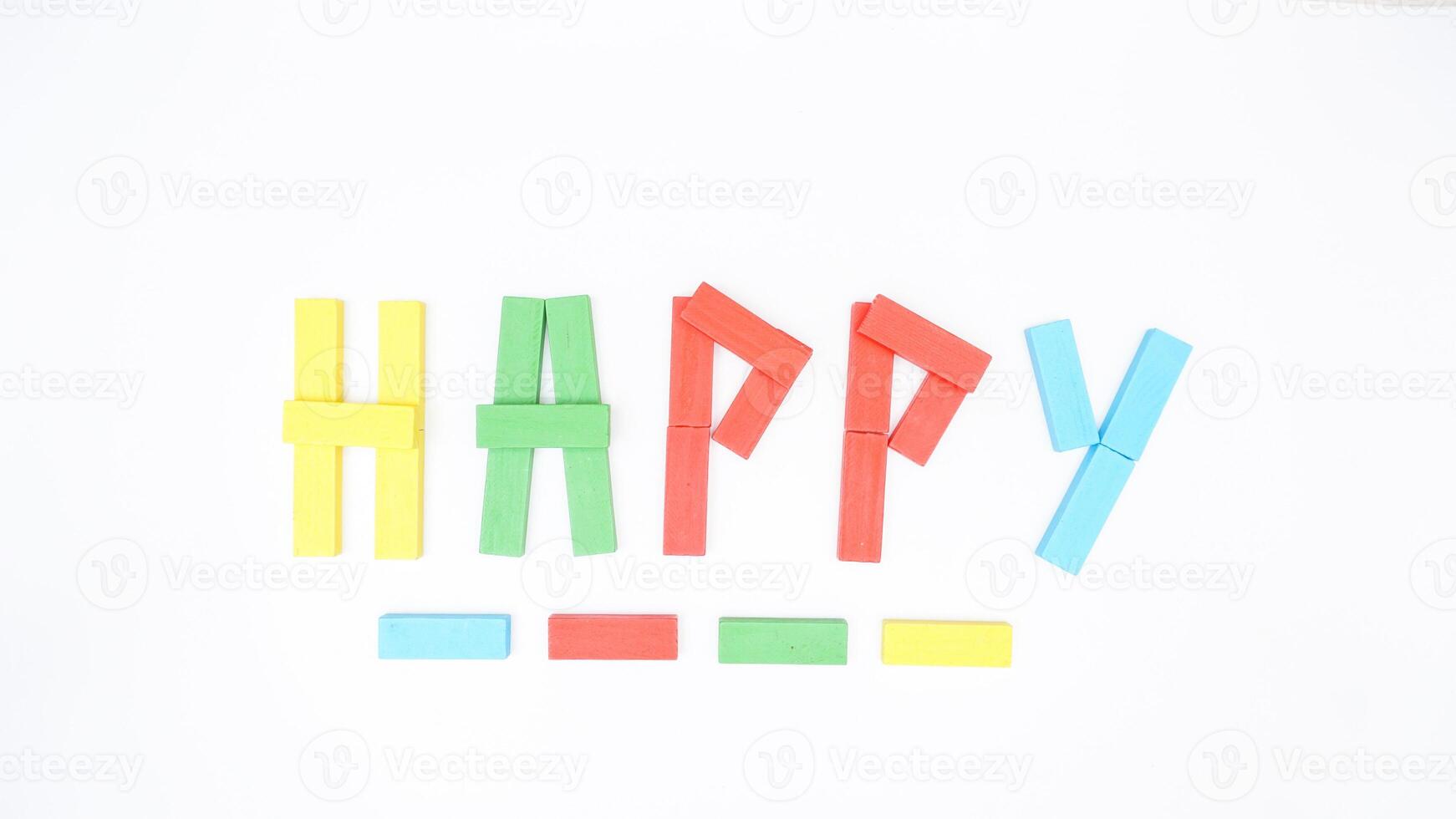 Selective focus of wooden blocks of board game formed word HAPPY isolated on white background photo