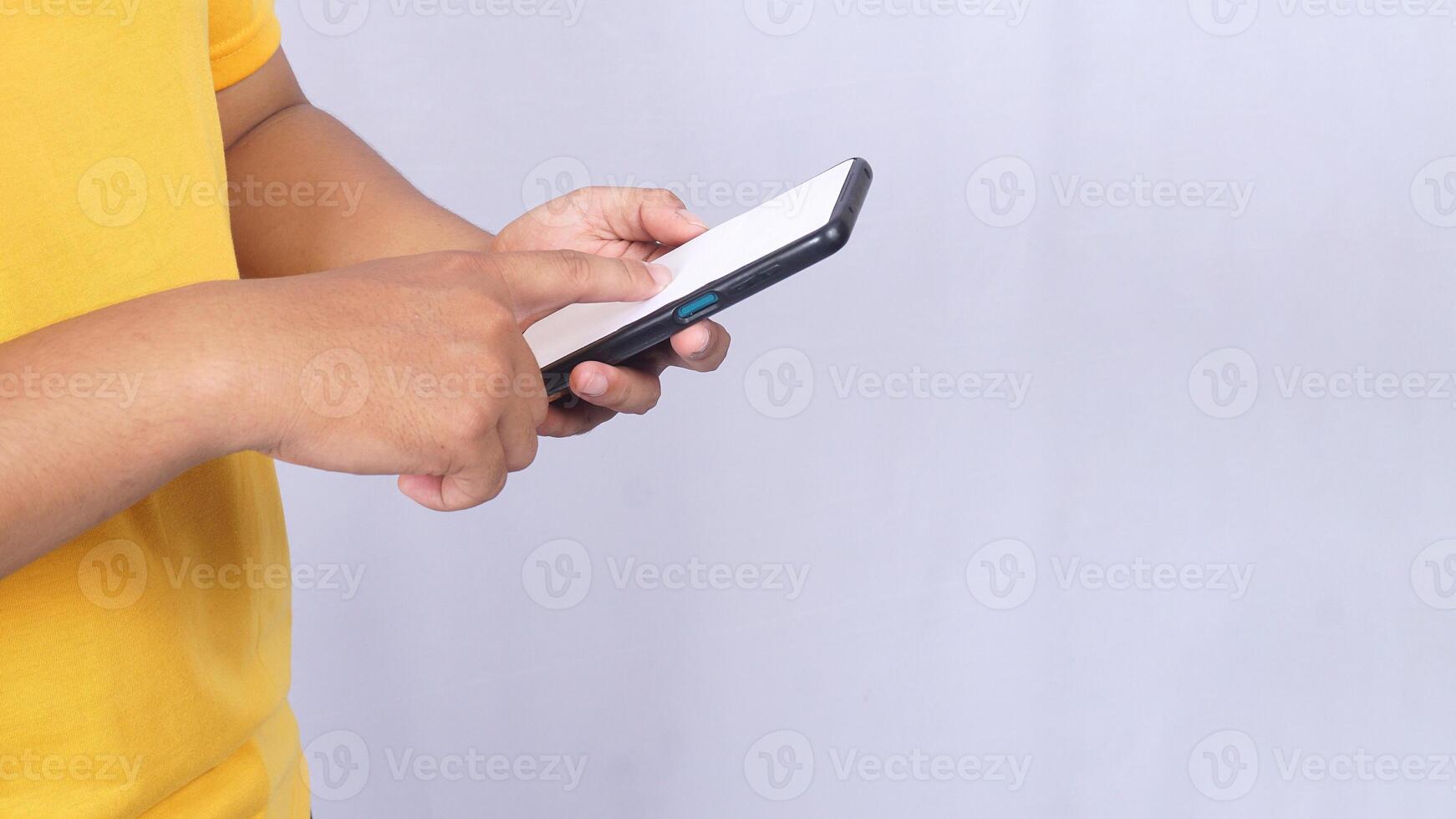 Man scrolling mobile phone blank screen mock up isolated on white background photo