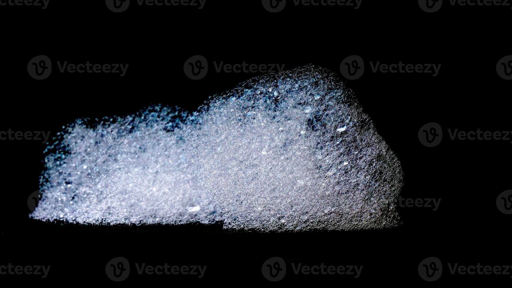 Bubbles foam texture isolated on black background photo