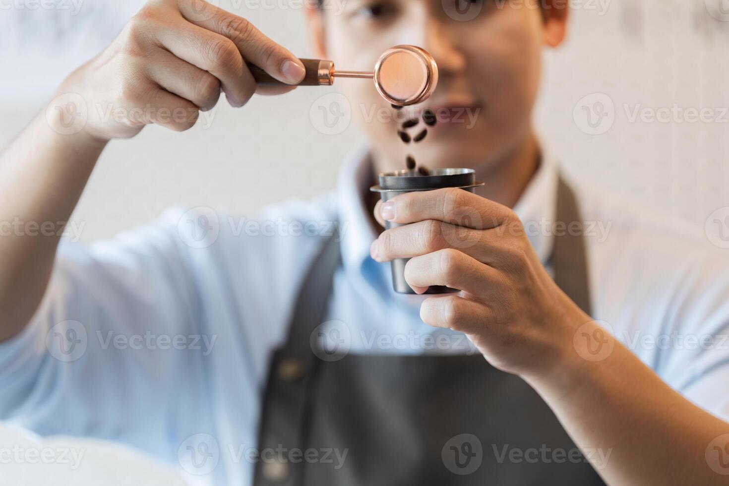 Precise Coffee Handling A barista measuring coffee beans with focus and skill. photo