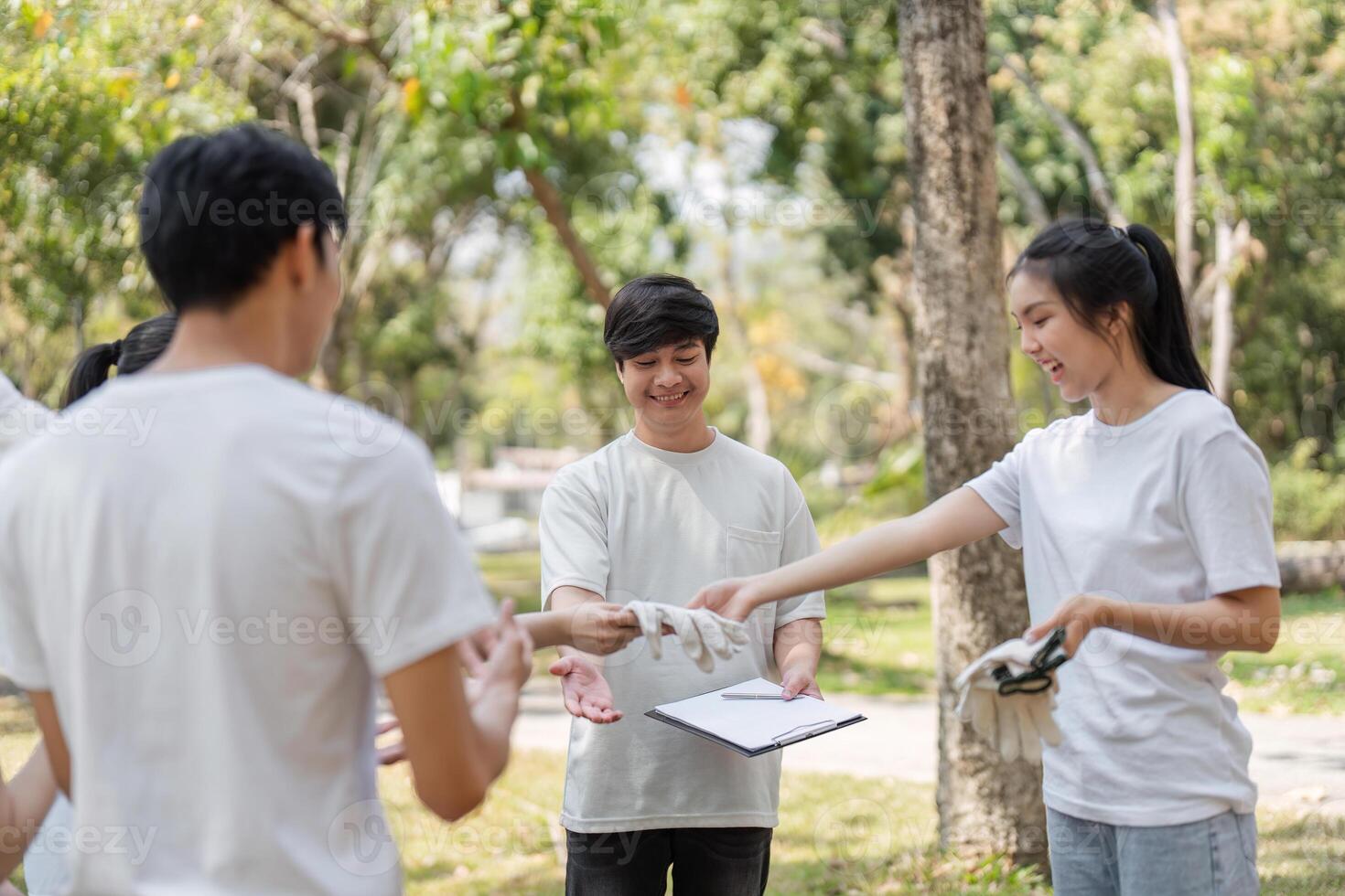 Preparation for Action. Volunteers receiving gloves and tools for the clean-up. photo