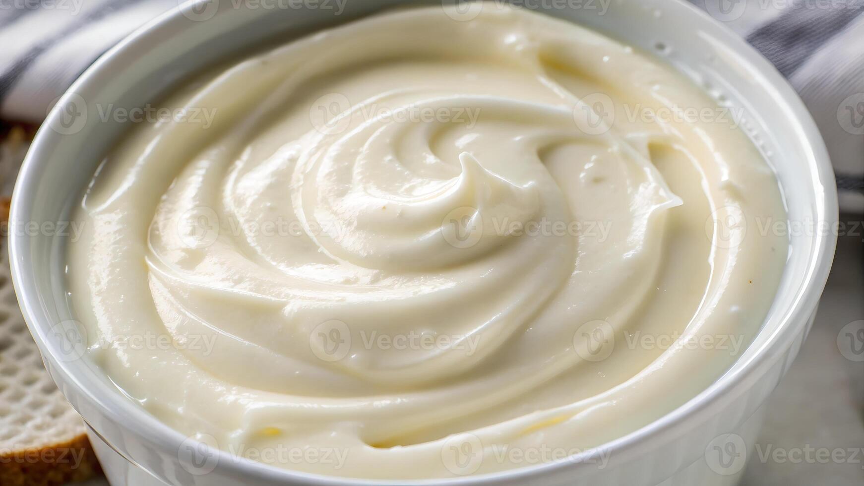 Creamy Whipped Butter in Elegant Bowl for Culinary Enthusiasts Seeking Gourmet Ingredients to Enhance Their Cooking and Baking Adventures with Rich, Smooth Flavors photo