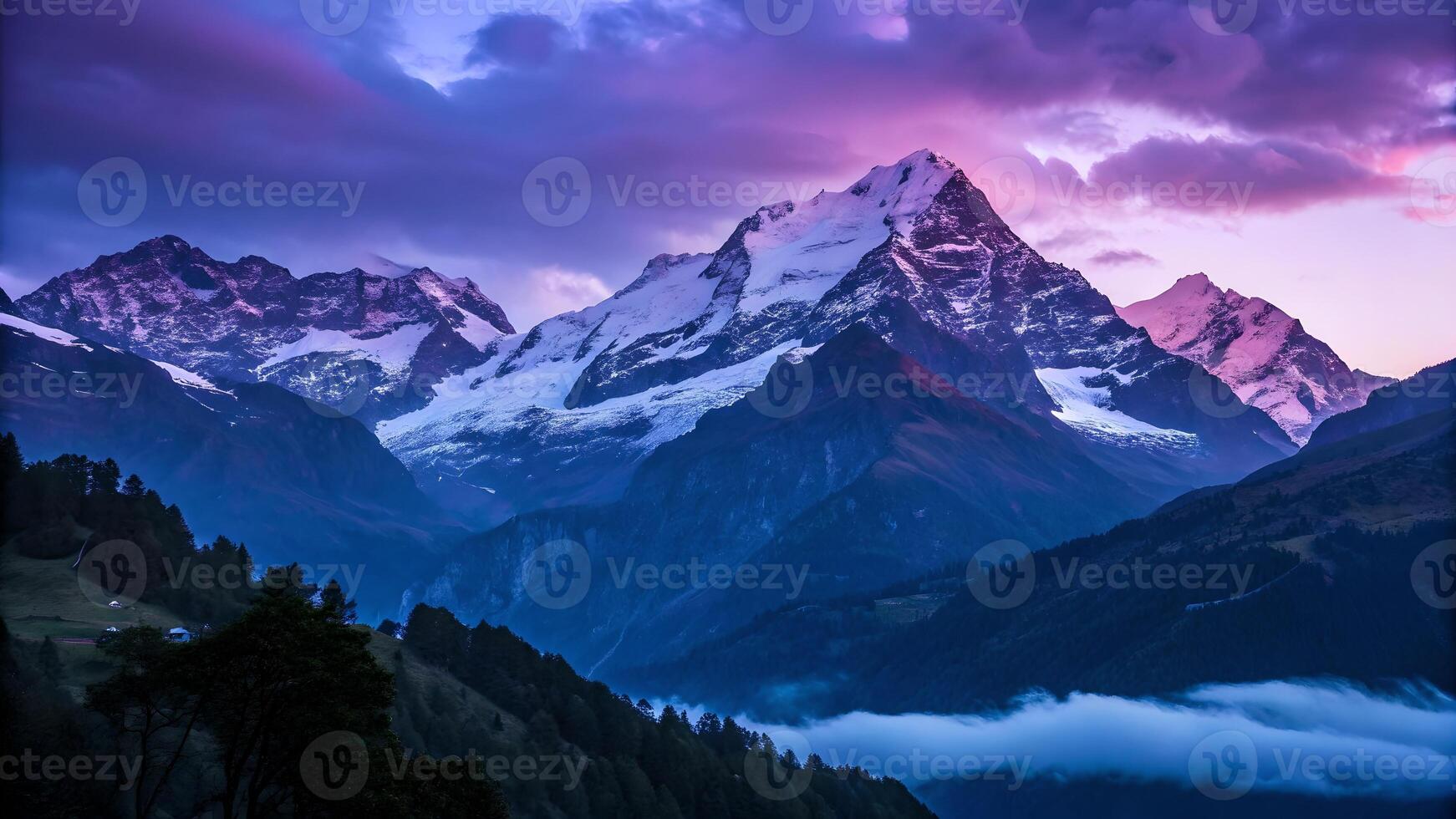 Snowy mountain peaks glowing at sunset in a serene valley for nature enthusiasts and photographers photo