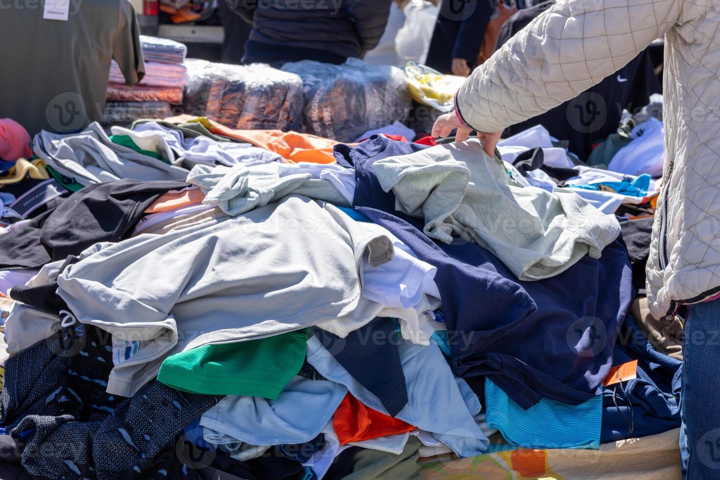 Bazaar. Turkish stall with various fake designer clothing items photo