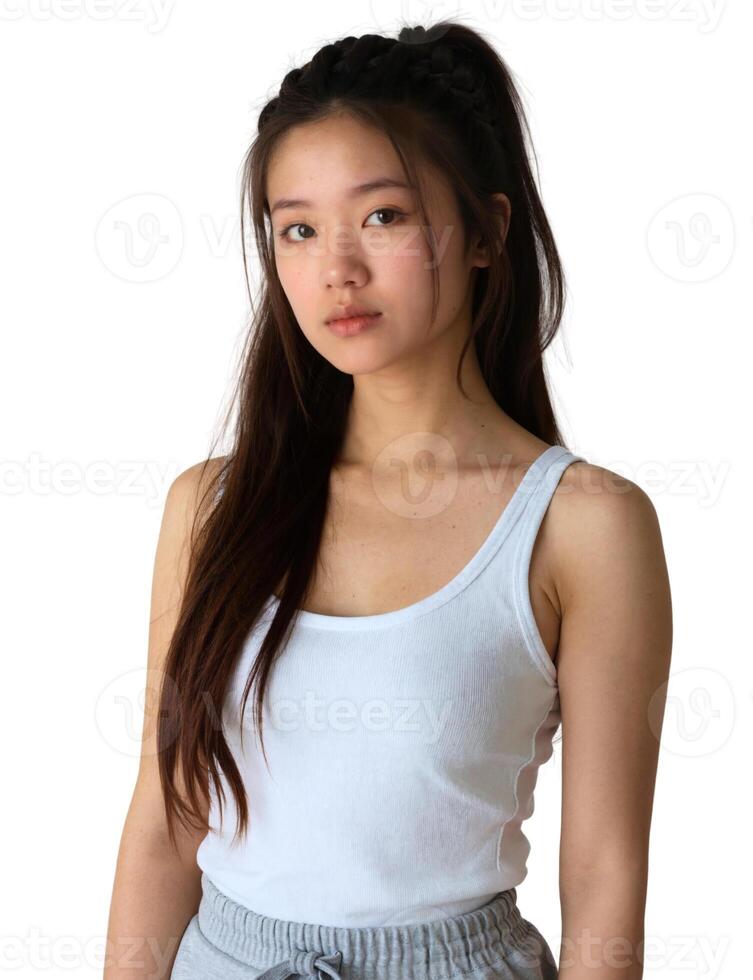 A young asian woman wearing a white tank top photo