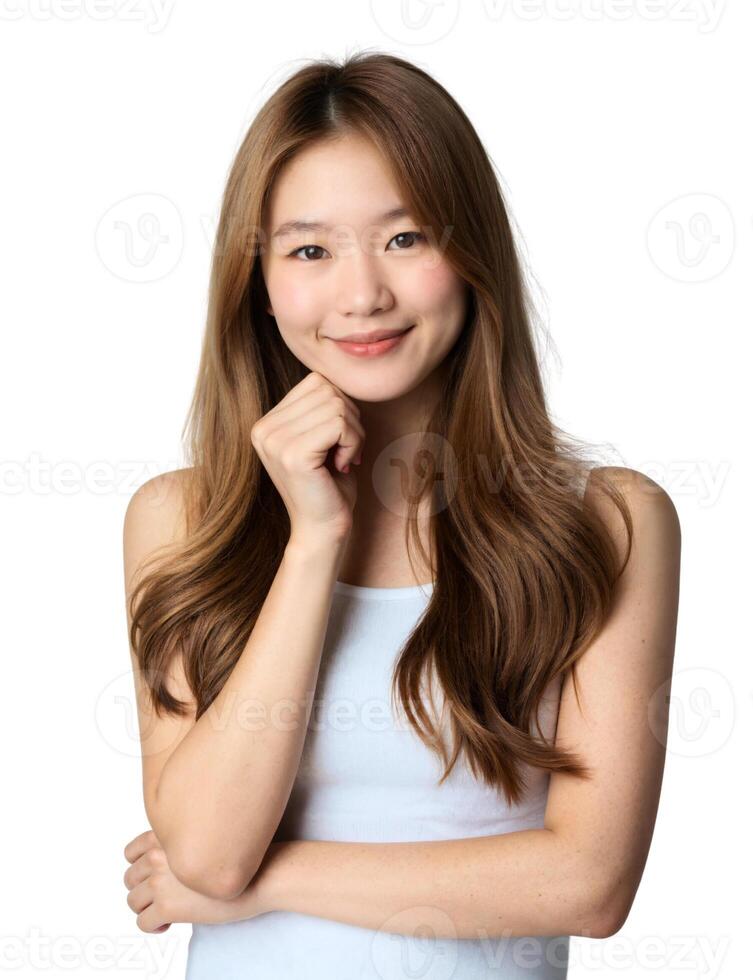 Asian woman smiling with hand on chin photo