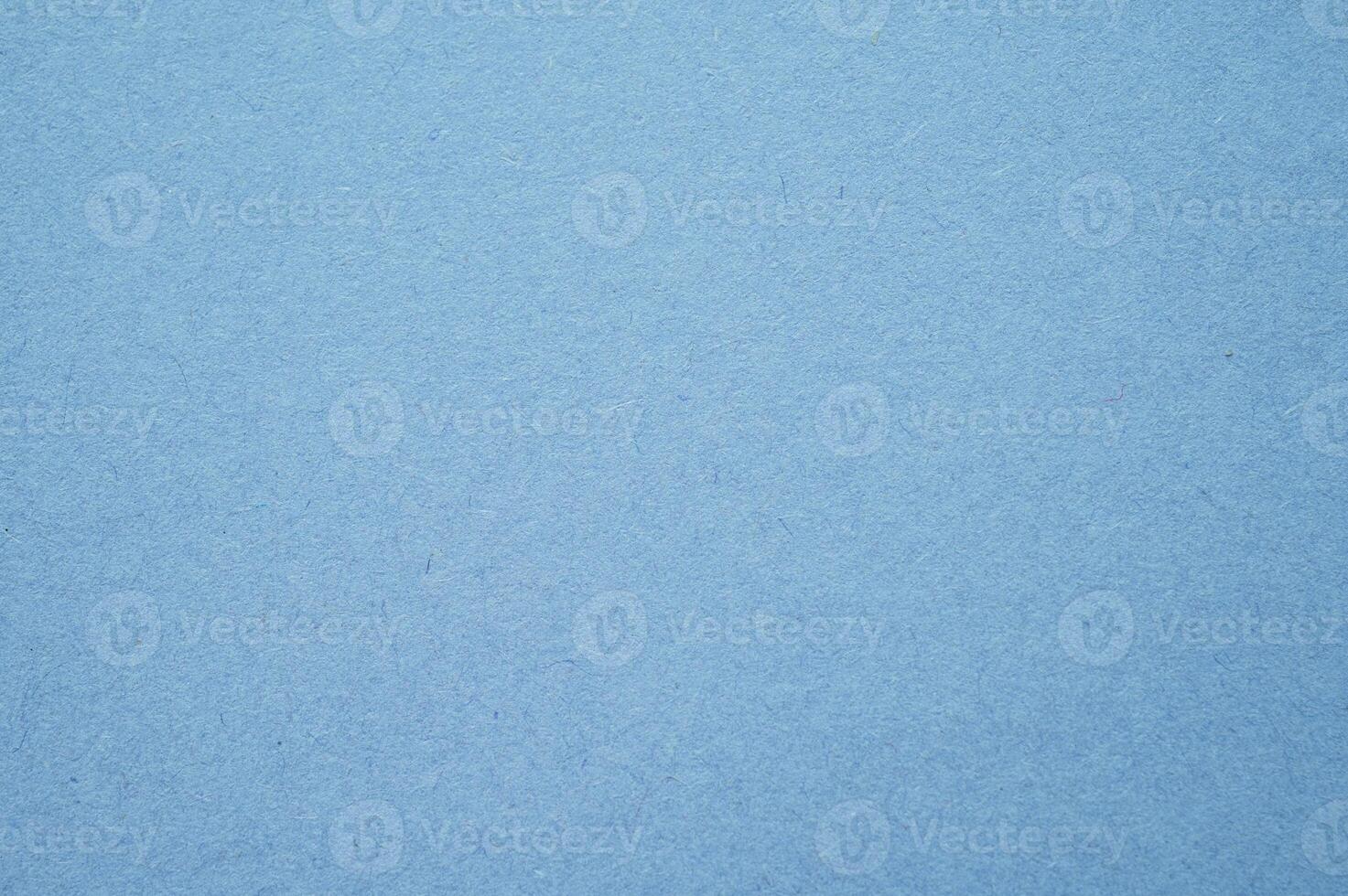Full frame shot of light blue paper sheet texture and background. photo