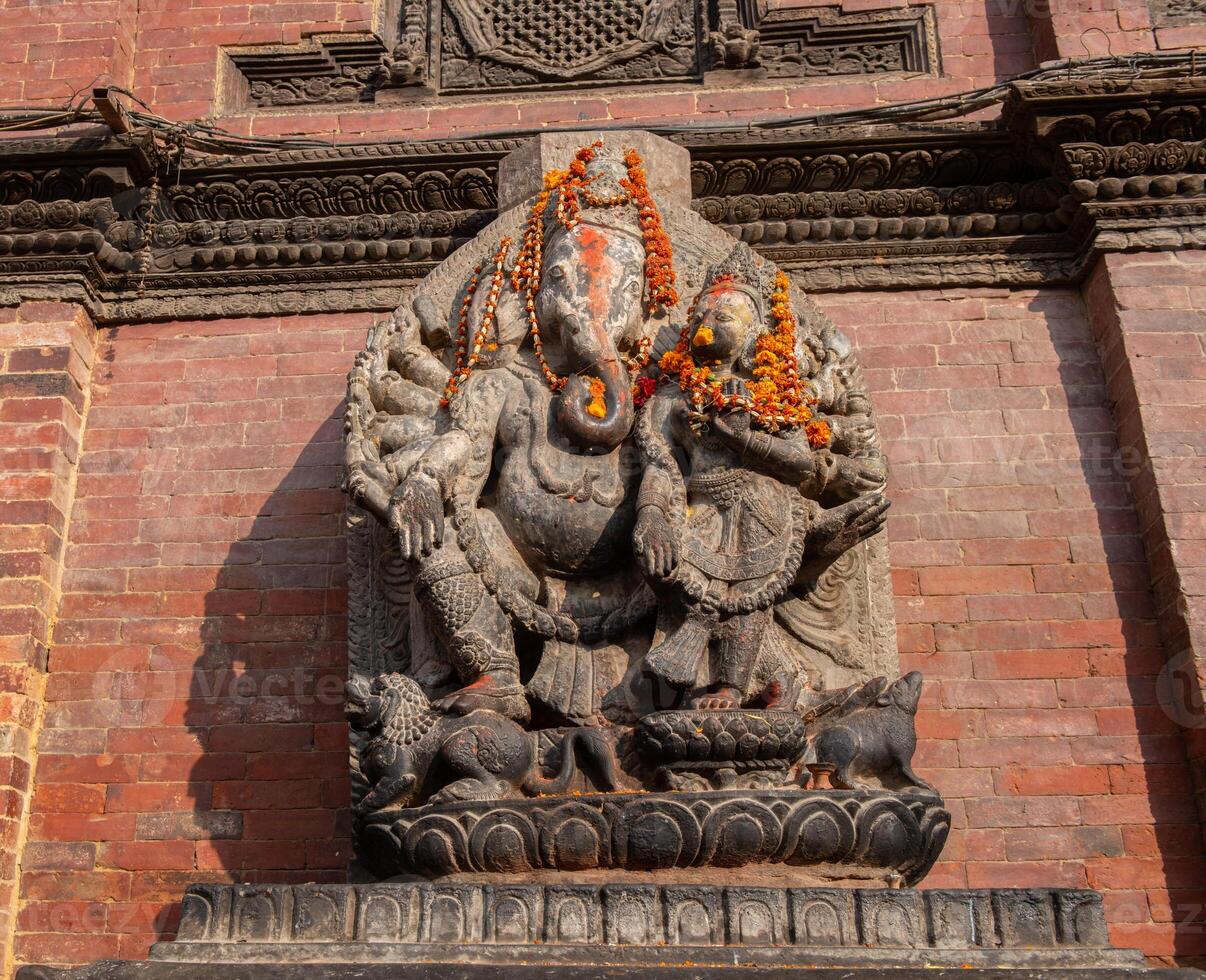 The stone sculpture of Ganesha the lord of success in Hindu religion, Kathmandu, Nepal. photo