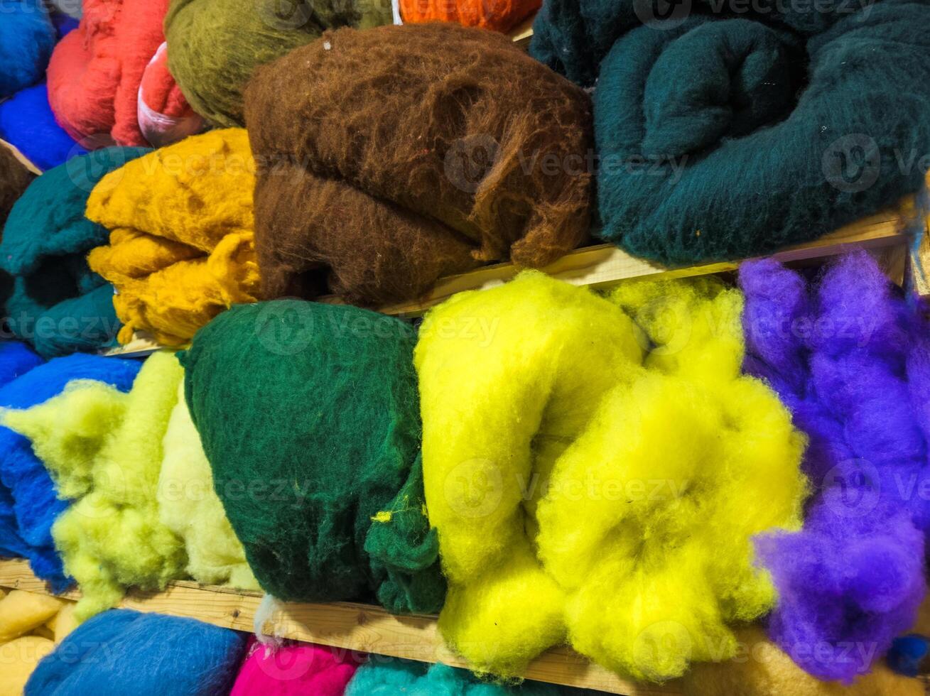 Vibrantly Colored felt are in showcase at bazaar photo