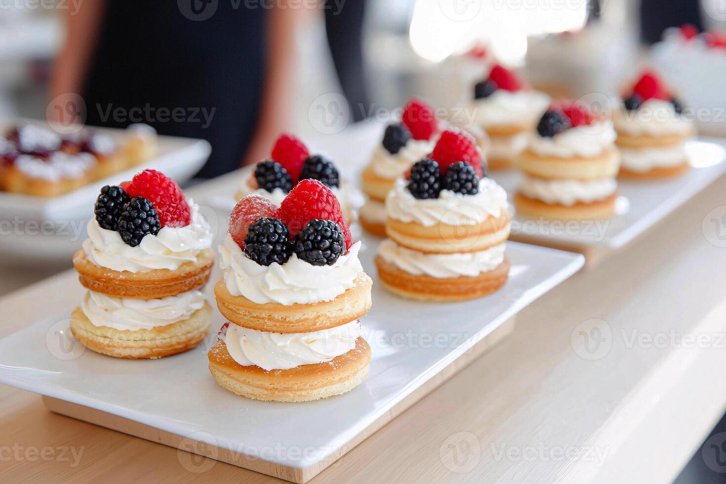 Delicate clair tower with cream and fruit accents, focusing on elegant and bold dessert flavor combinations photo