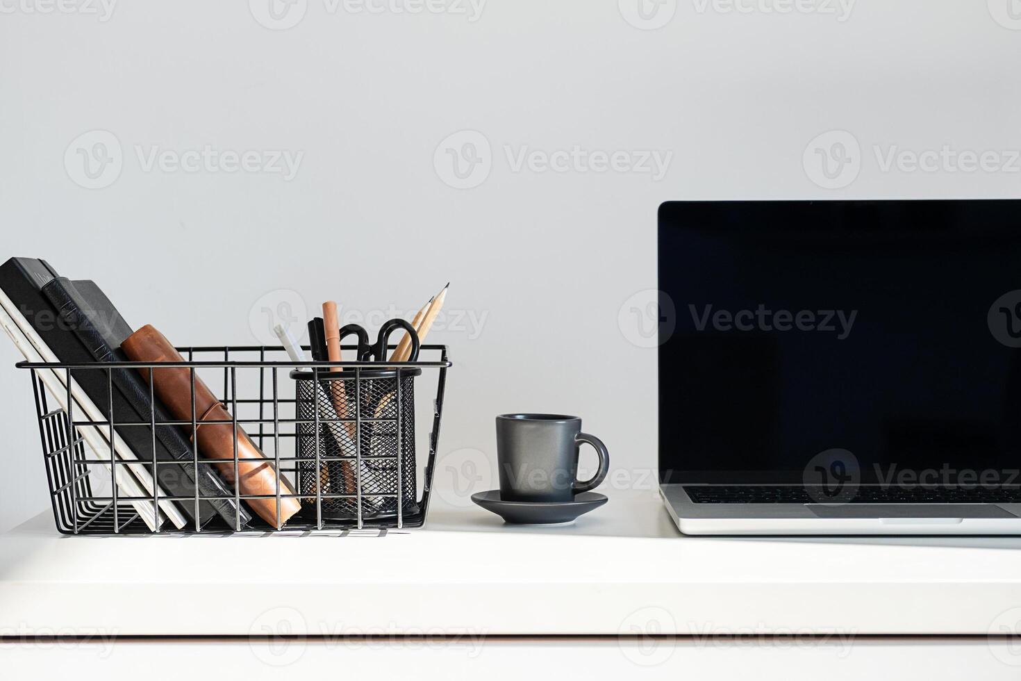 Laptop With Espresso Coffee Cup On Desk. Workspace scene. photo