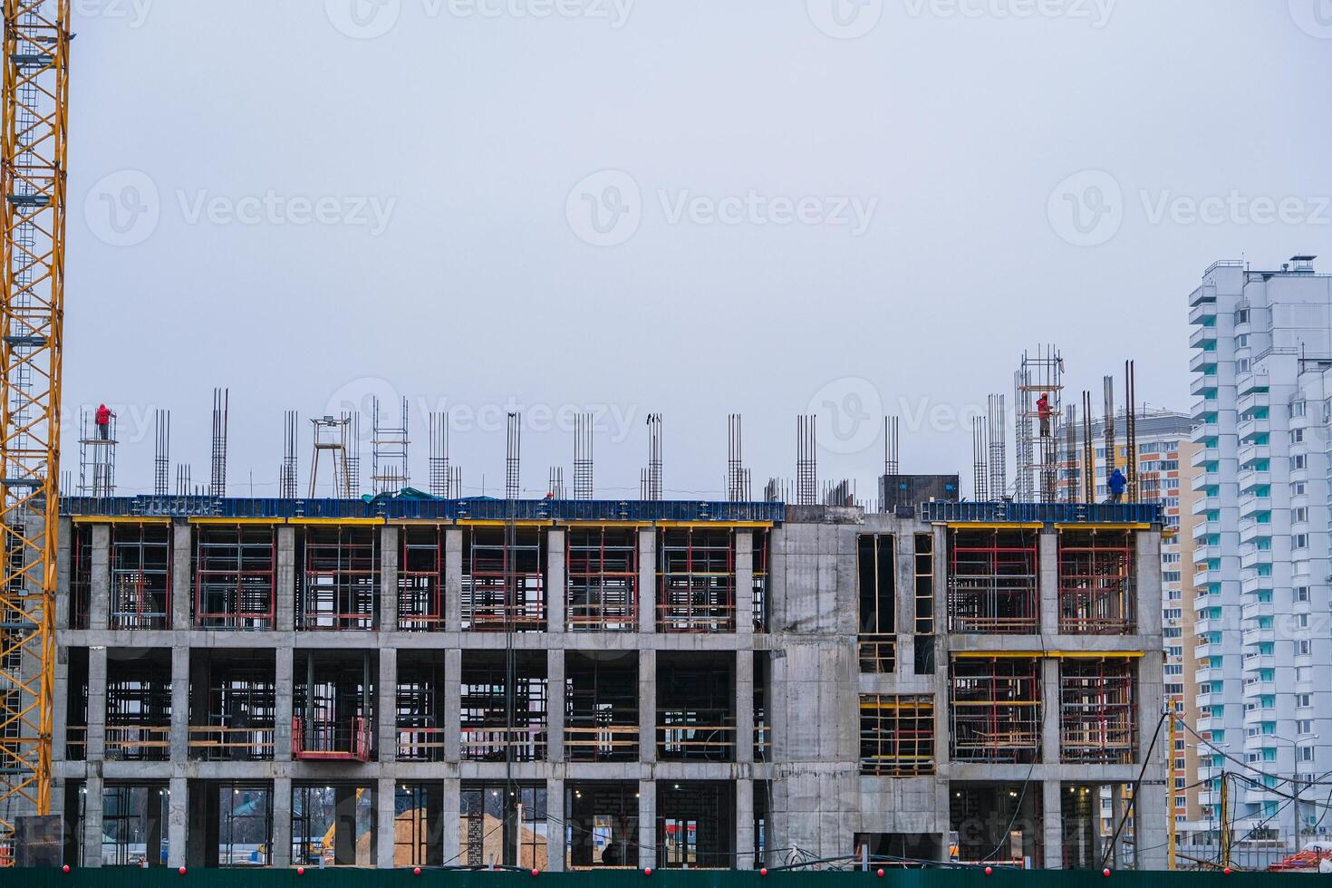 Construction of the building, erection of metal structures for pouring a new floor photo
