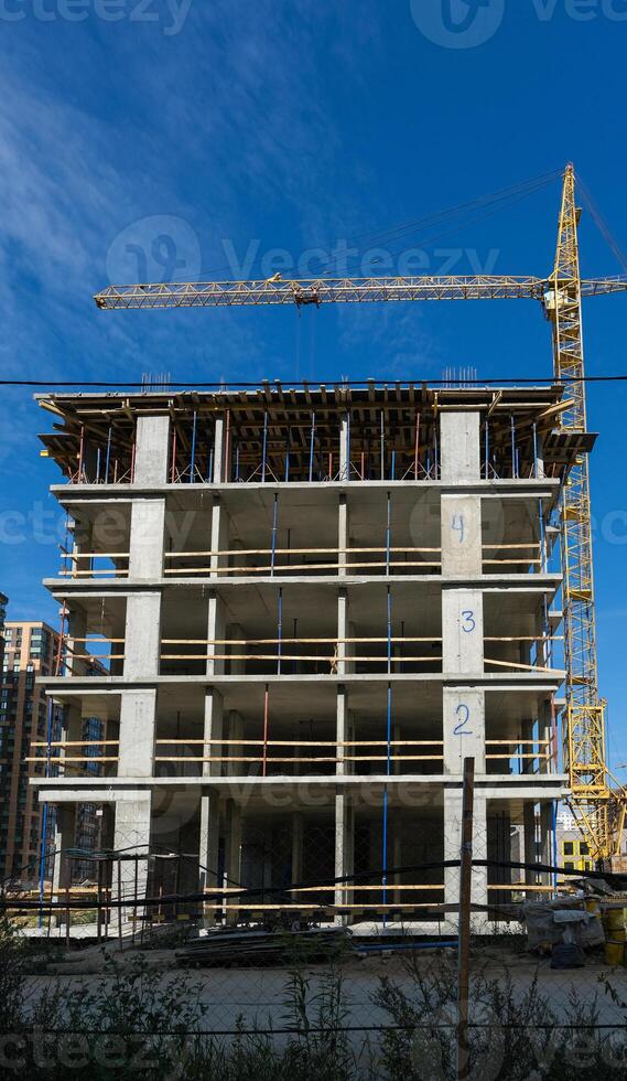 Skeleton of a residential multi-storey apartment building in a new district photo