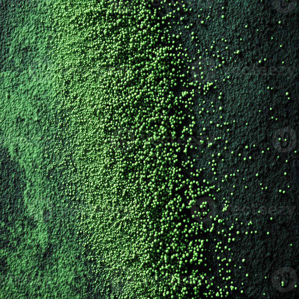 Moringa powder spread out with vibrant green granules photo
