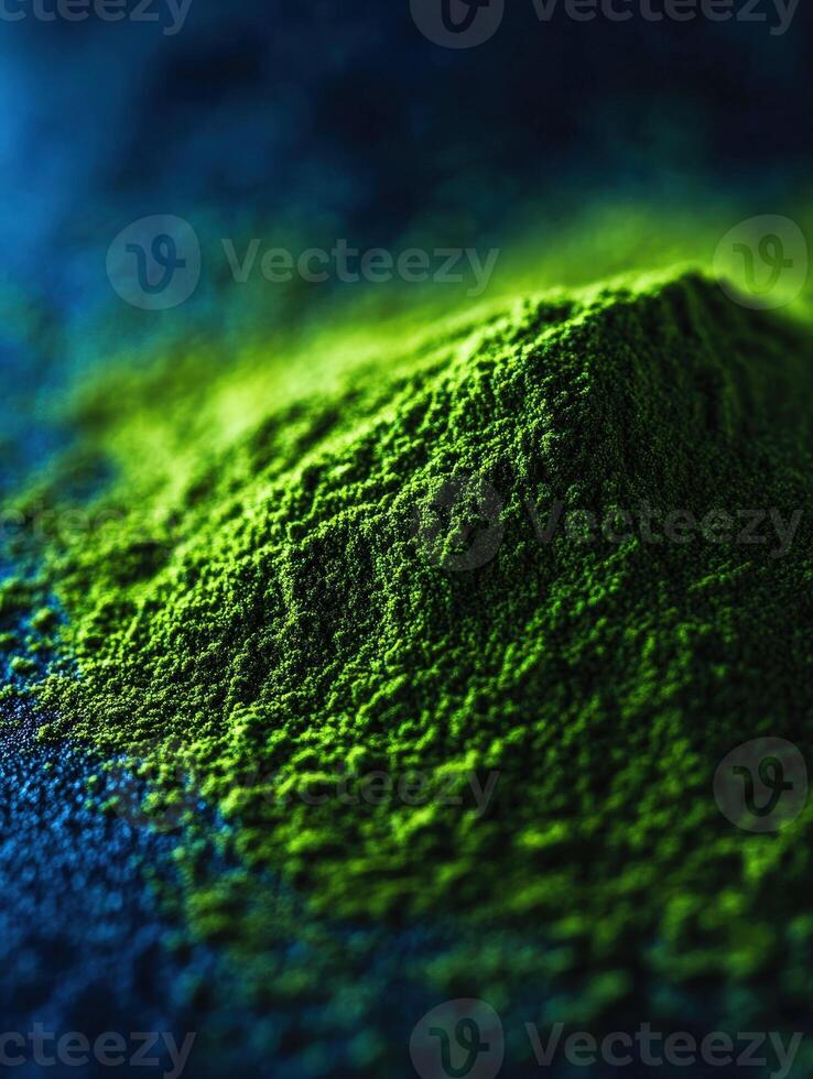 Moringa powder displayed on a textured surface in vibrant colors photo