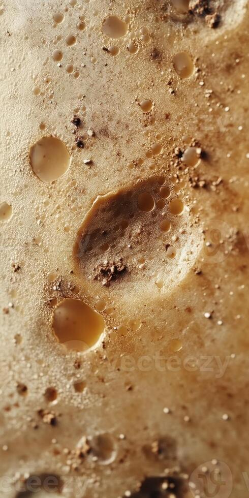 Gouda cheese showing texture with holes and surface details photo