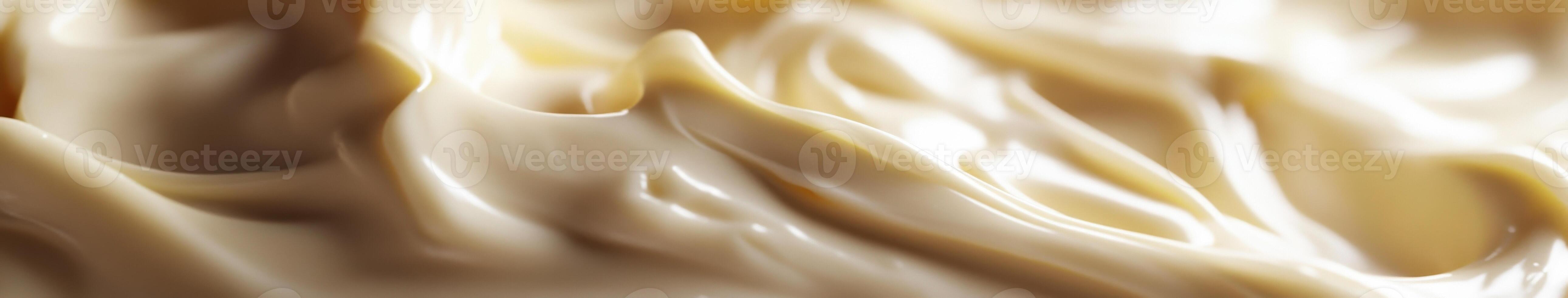 A close up of a white liquid with some swirls photo