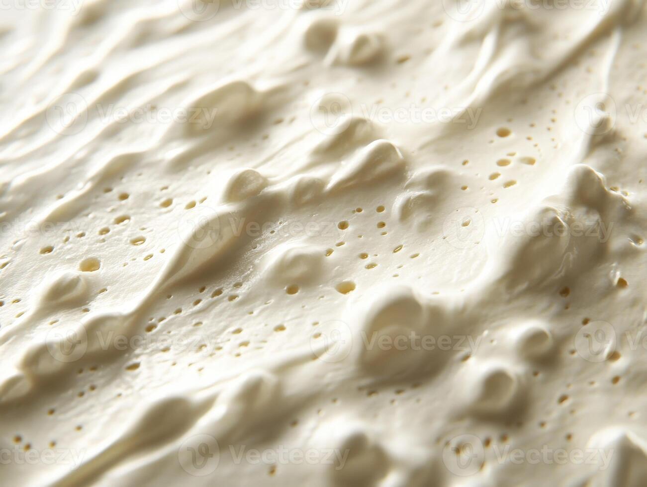 Soft cheese texture featuring creamy and smooth surface details photo