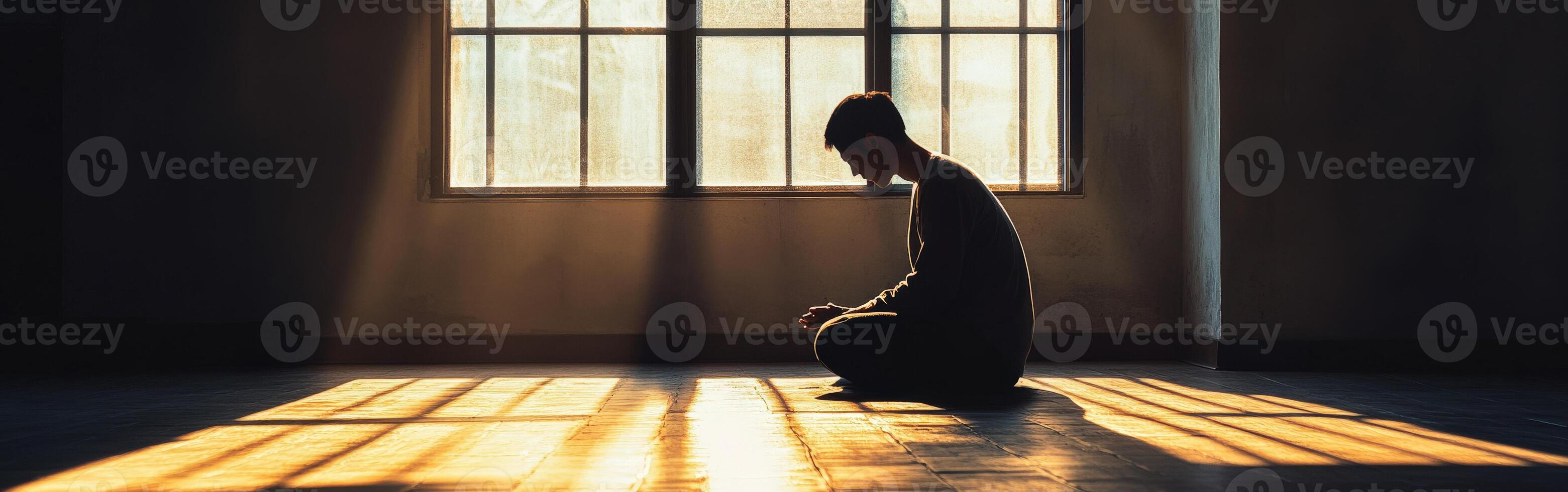 Reflection and solitude in a sunlit room with warm light photo