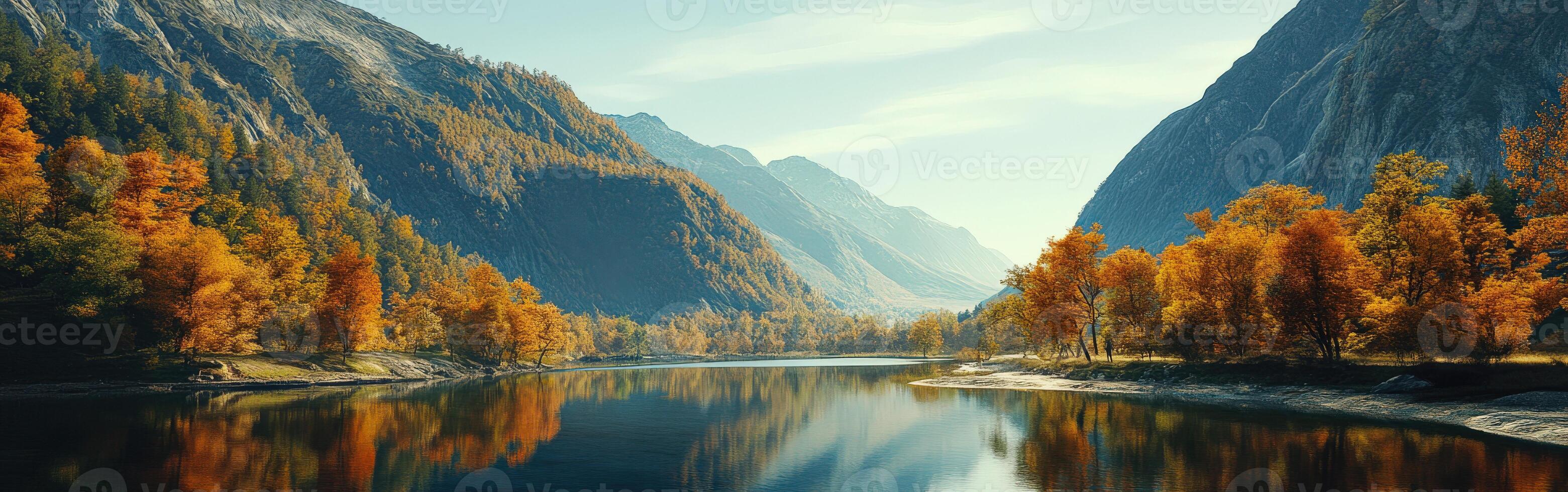 Mountain river flows through autumn landscape showcasing vibrant colors and serene reflections in the water photo