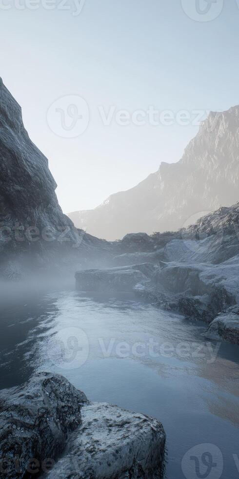 Mountain river flows smoothly between rocky cliffs at dawn with mist rising from the water's surface photo
