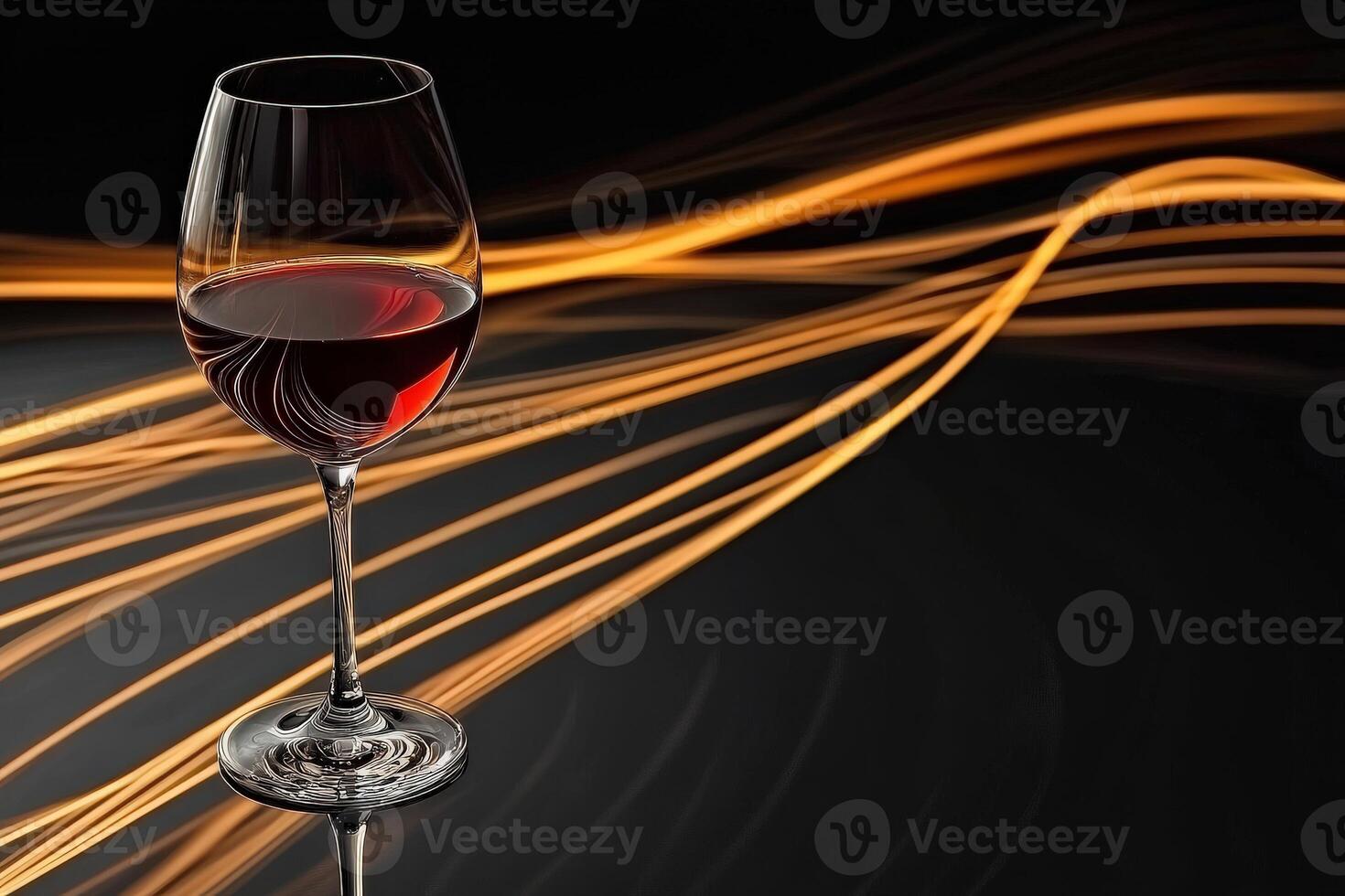 Elegant red wine glass reflecting light against a dark backdrop with swirling golden lines in the background photo