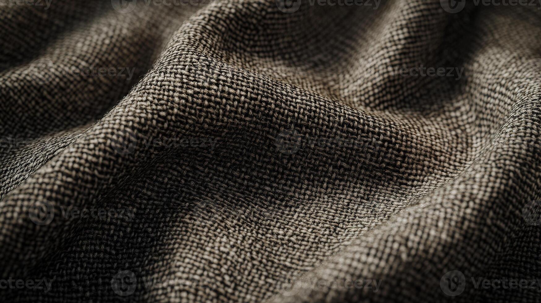 Textured boucle fabric showcasing its intricate weave and depth in warm neutral tones photo
