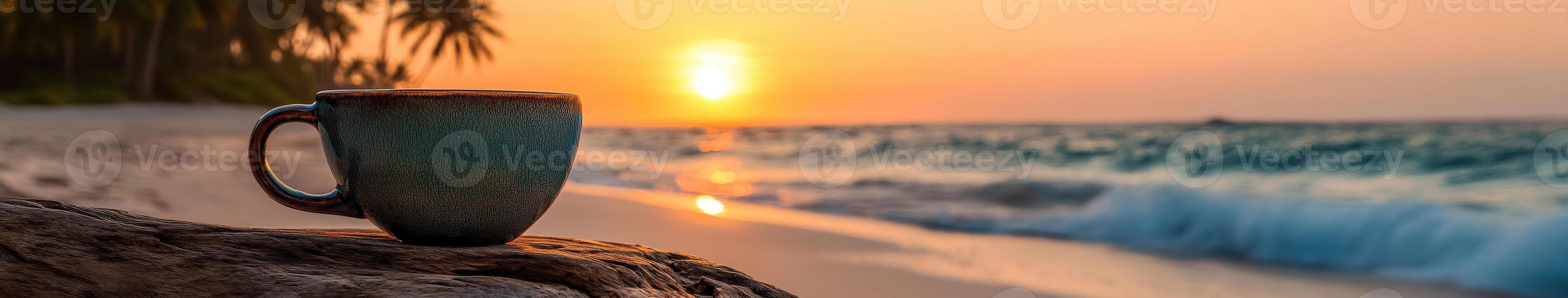 Enjoying coffee by the sea while watching the sunset on a tranquil beach photo