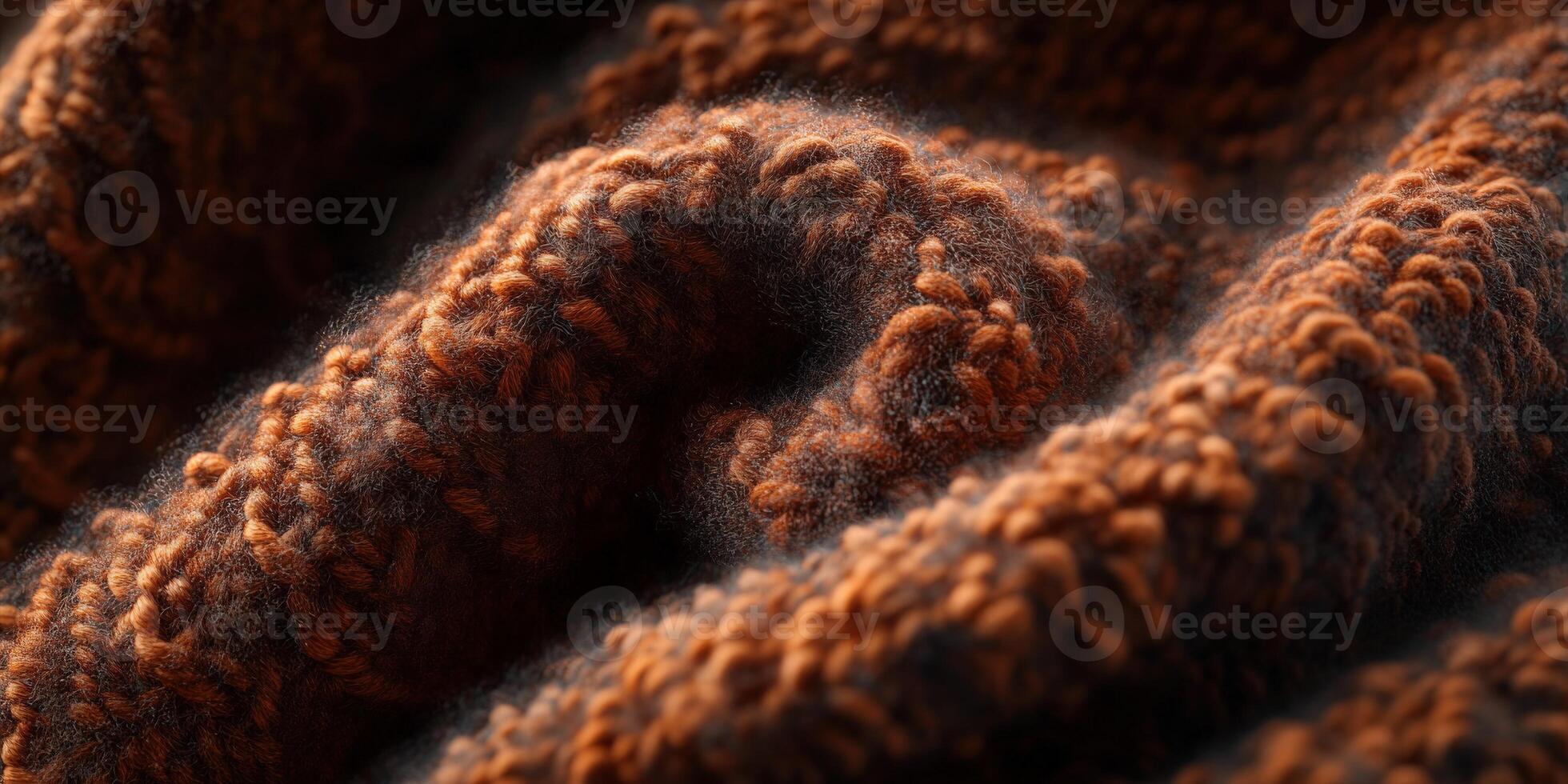 Soft brown textured fabric displaying intricate patterns and warmth in close-up during autumn light photo