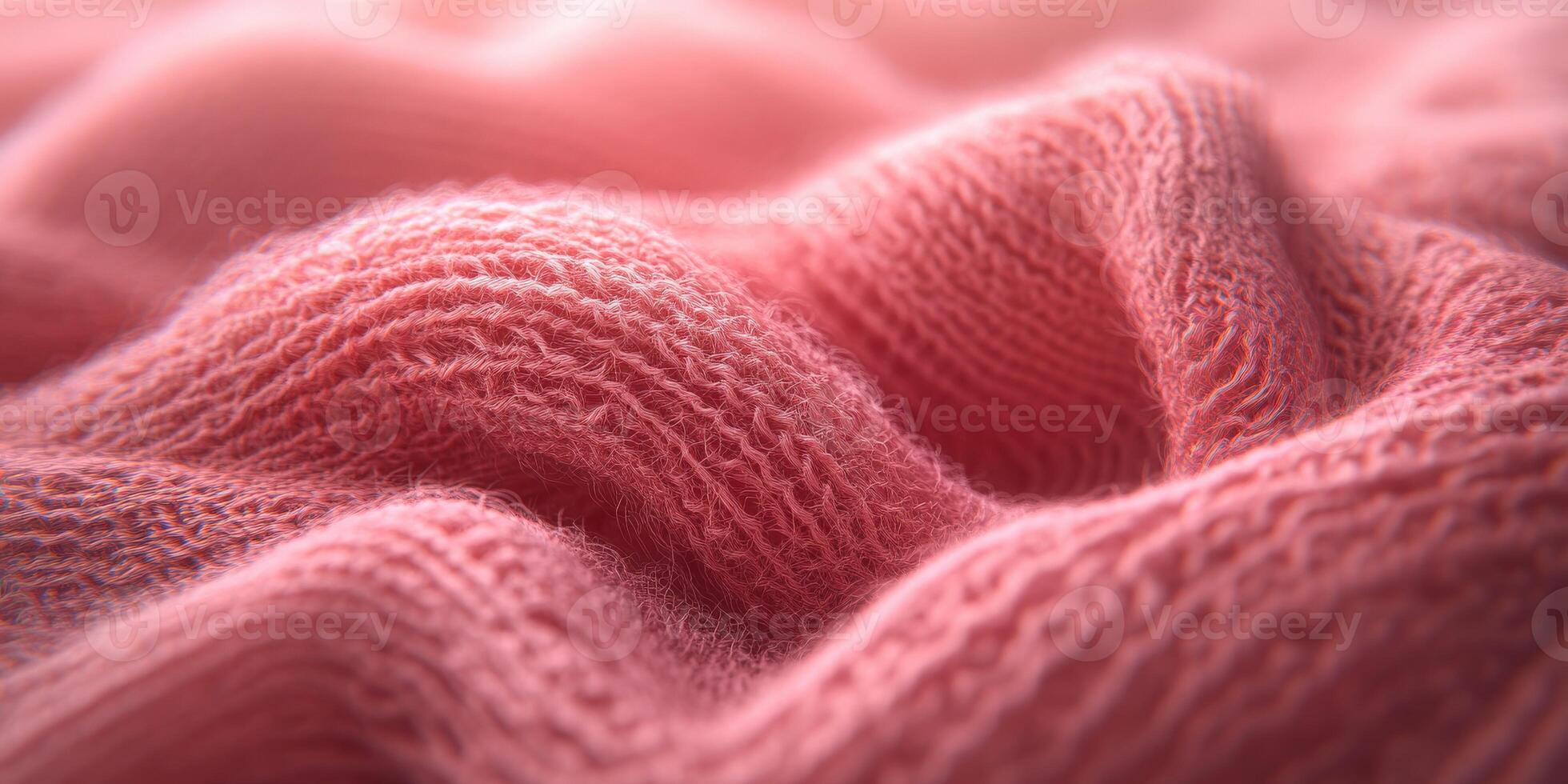 Boucle fabric texture showcases soft and cozy waves in a warm pink hue suitable for various fabric applications and textiles photo
