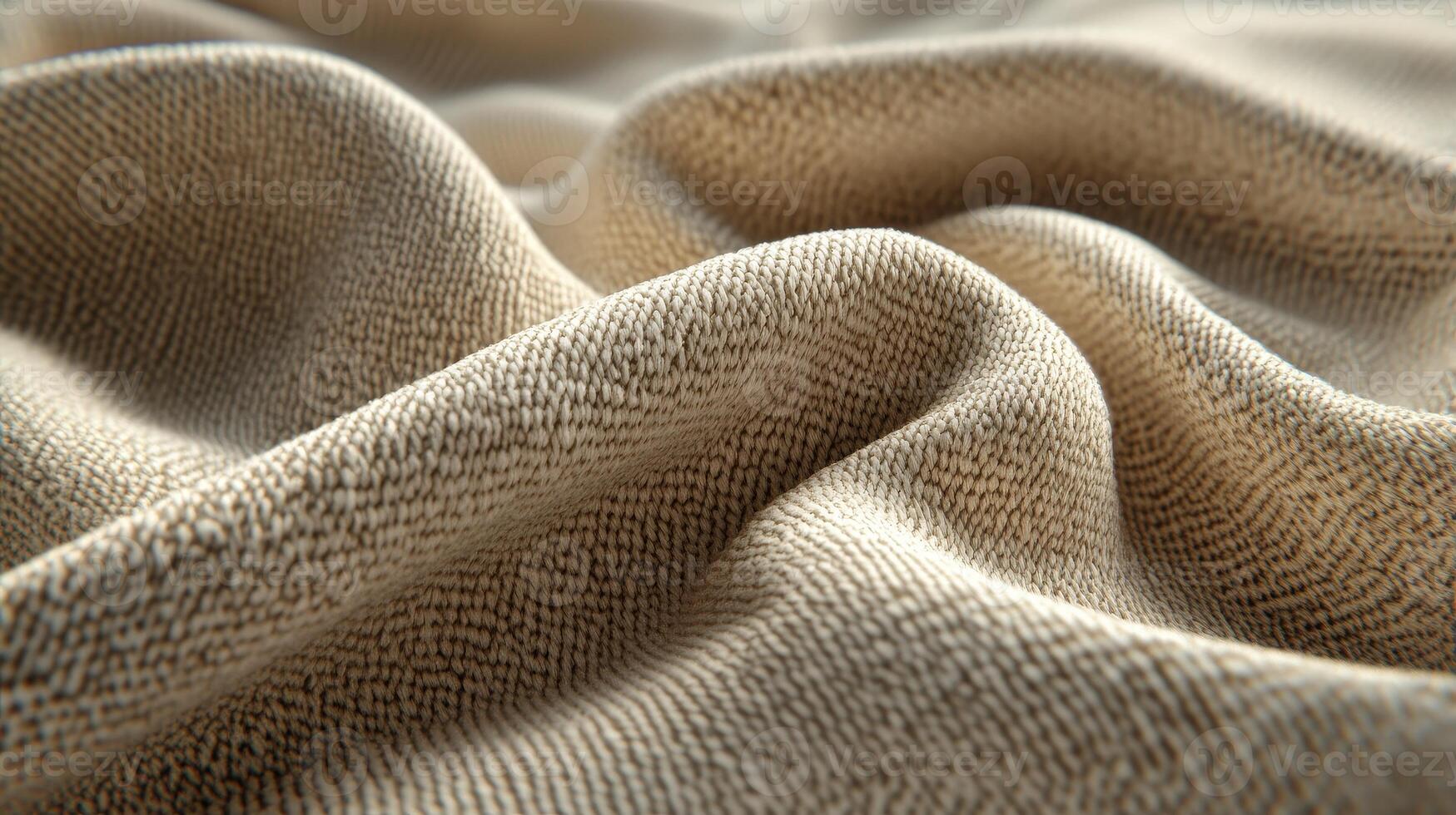 Textured boucle fabric draped softly with natural light highlighting its intricate surface details photo
