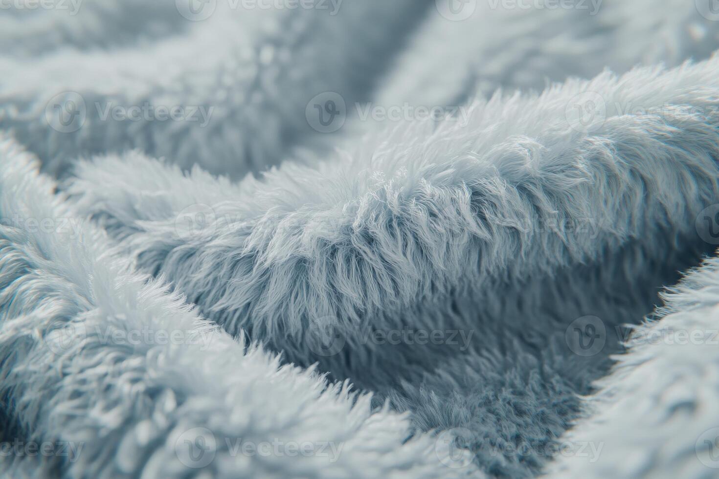 Soft and luxurious boucle fabric texture showcasing its distinctive weave and plush feel in serene blue tones photo